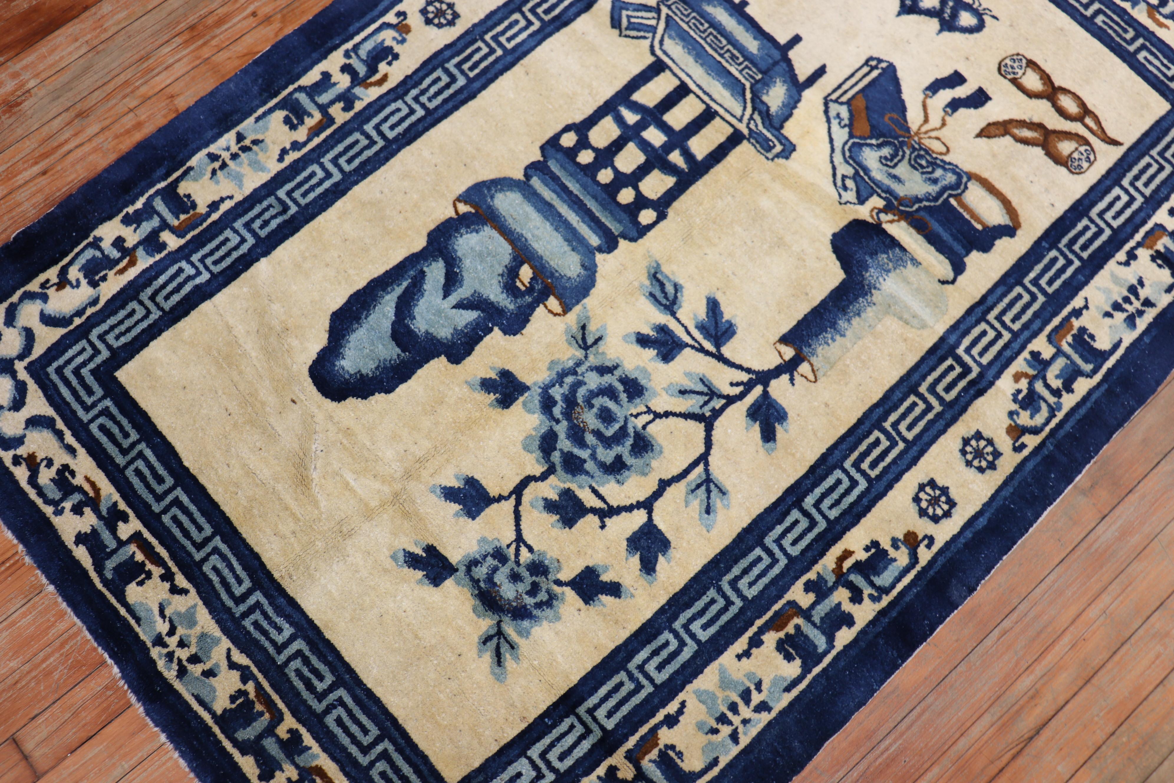 An early 20th century Chinese Peking carpet in tan and blue colors featuring a whimsical motif. Even Full Pile Condition

circa 1920, measures: 3'8'' x 5'7