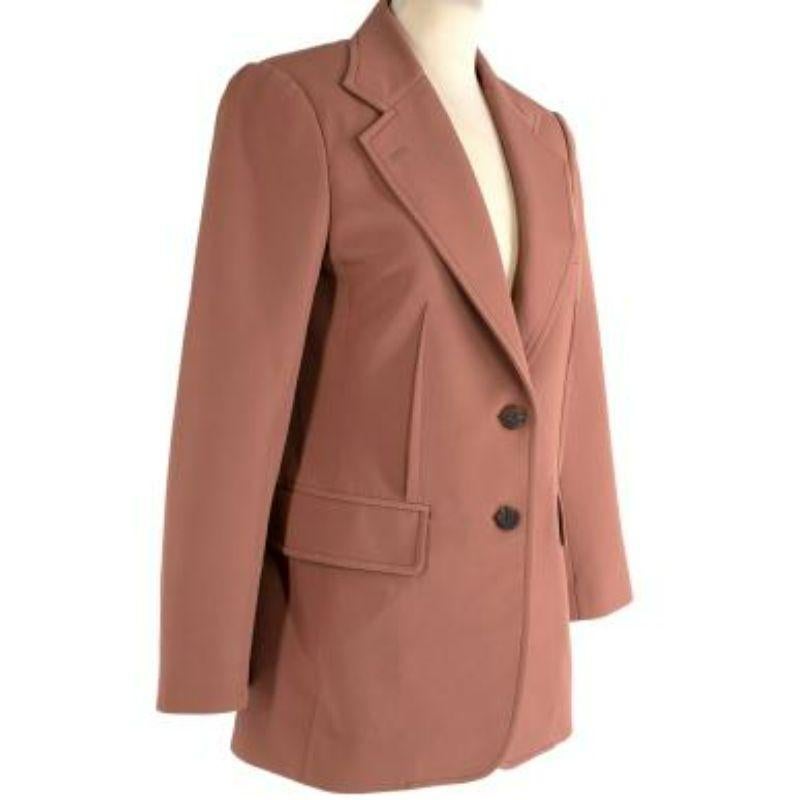 Chloe tan brown cotton-blend twill blazer
 
 - Warm, pink brown hue
 - Cotton-wool blend twill outer with satin lining
 - Notched lapel, single breast with double button fastening 
 - Flapped welt pockets
 -Central rear vent
 -Shoulder pads
 
