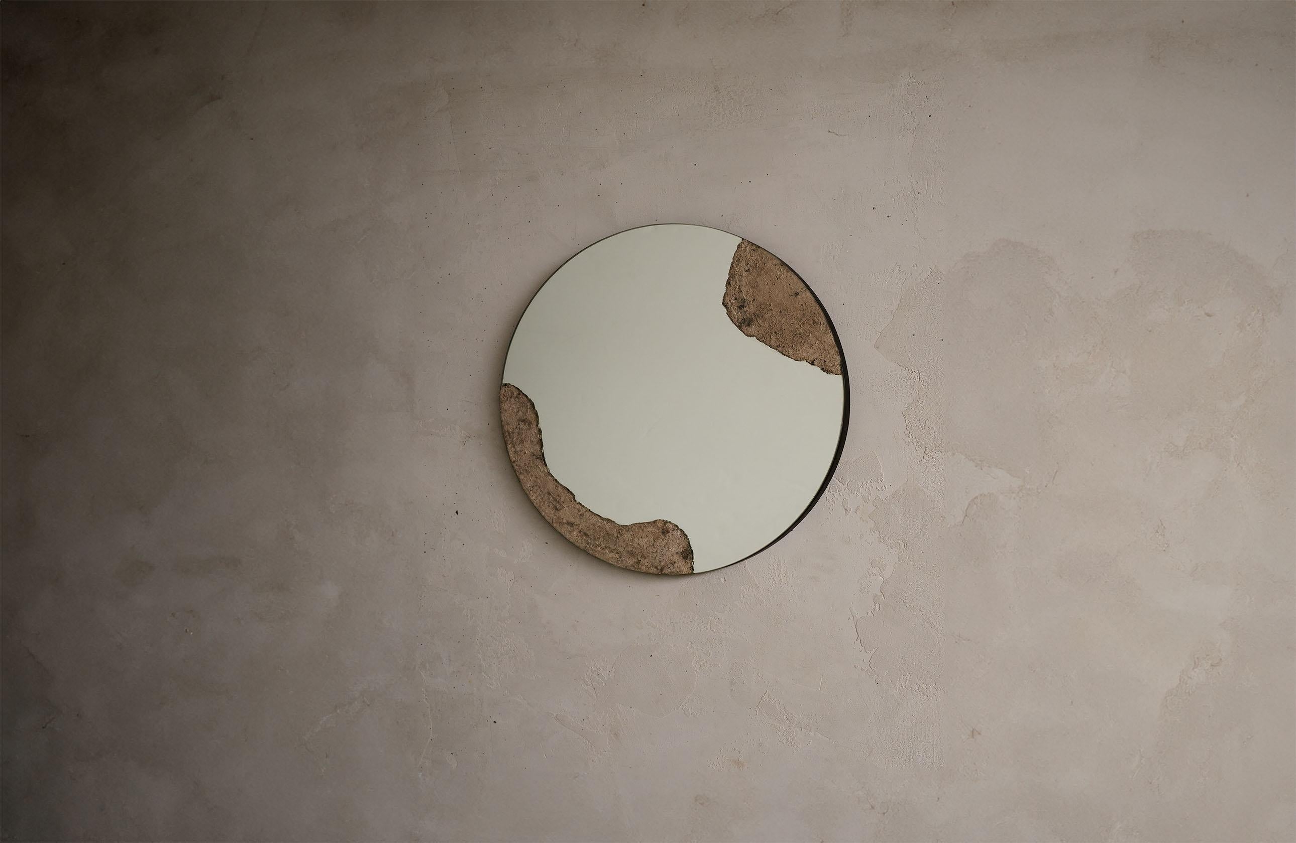 The Pompeii Round Mirror consists of burnt ash that is hand-spread and worked.

*Burnt Ash shape and color is organic and may differ from piece to piece to keep uniqueness in the artists own hand and technique.