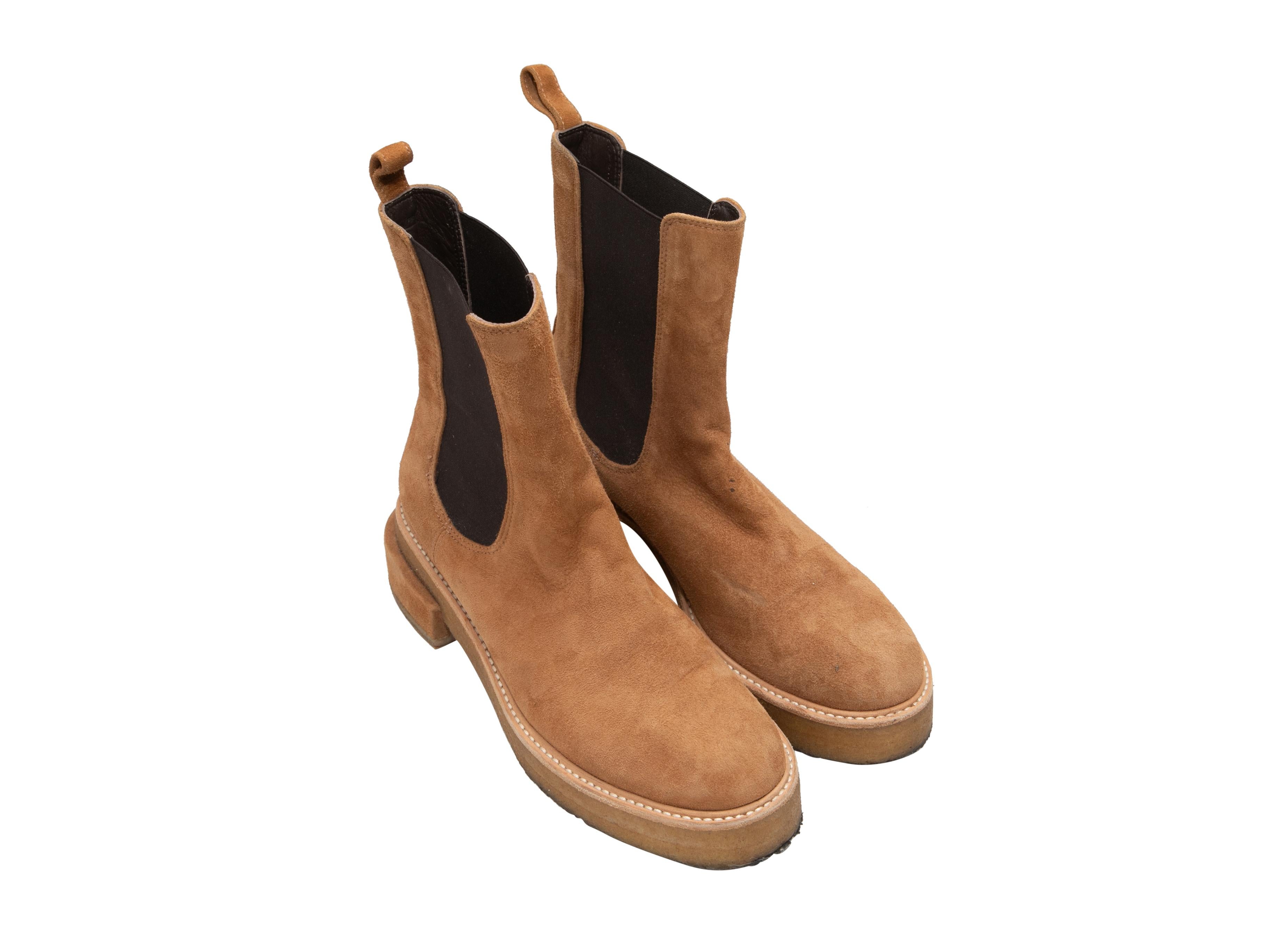 Tan suede platform boots by Frame. Elasticized gores at sides. Crepe rubber soles. 7.25