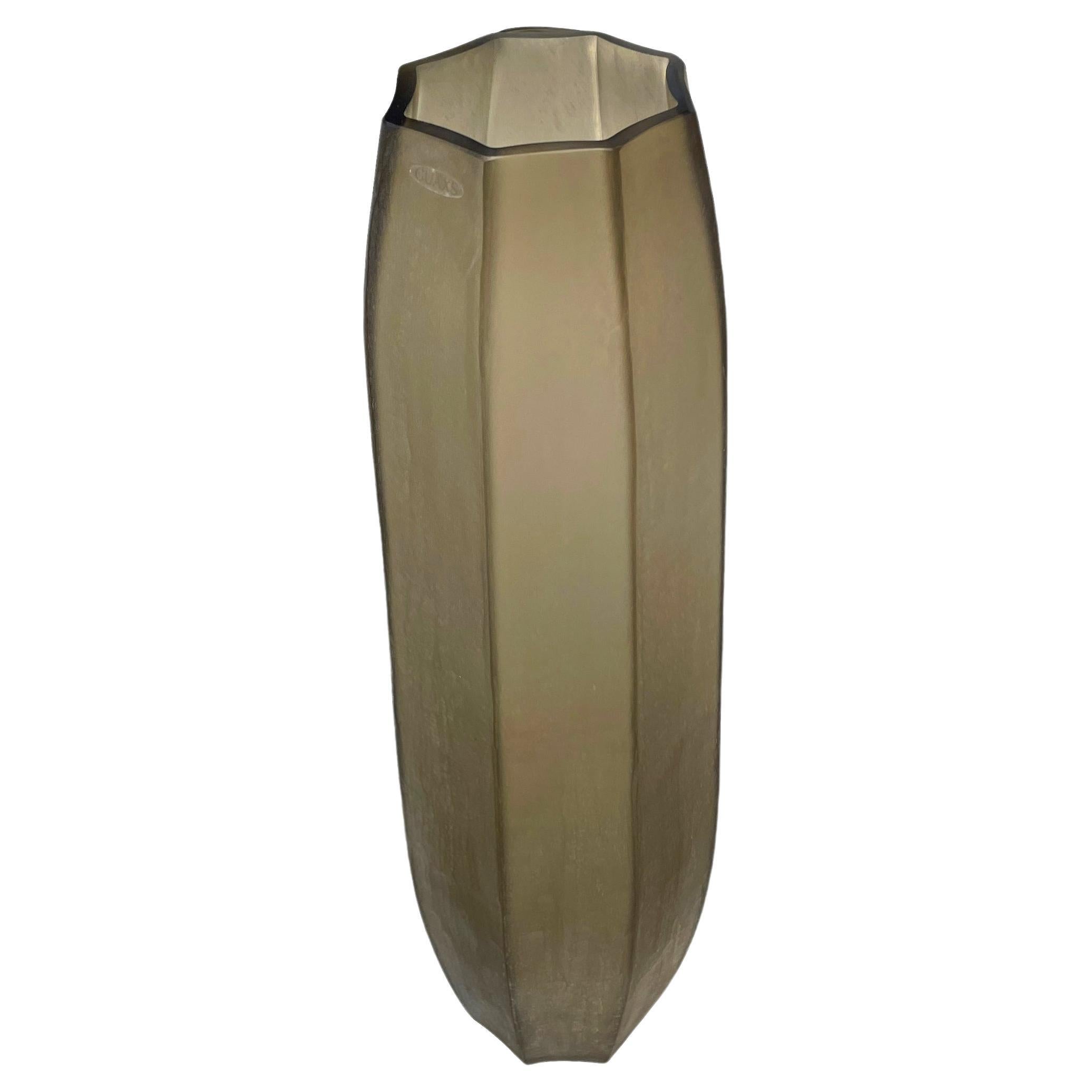 Contemporary Romanian tall octagonal shaped frosted tan color vase.
Can hold water.
Five tan glass vases in different shapes and sizes.