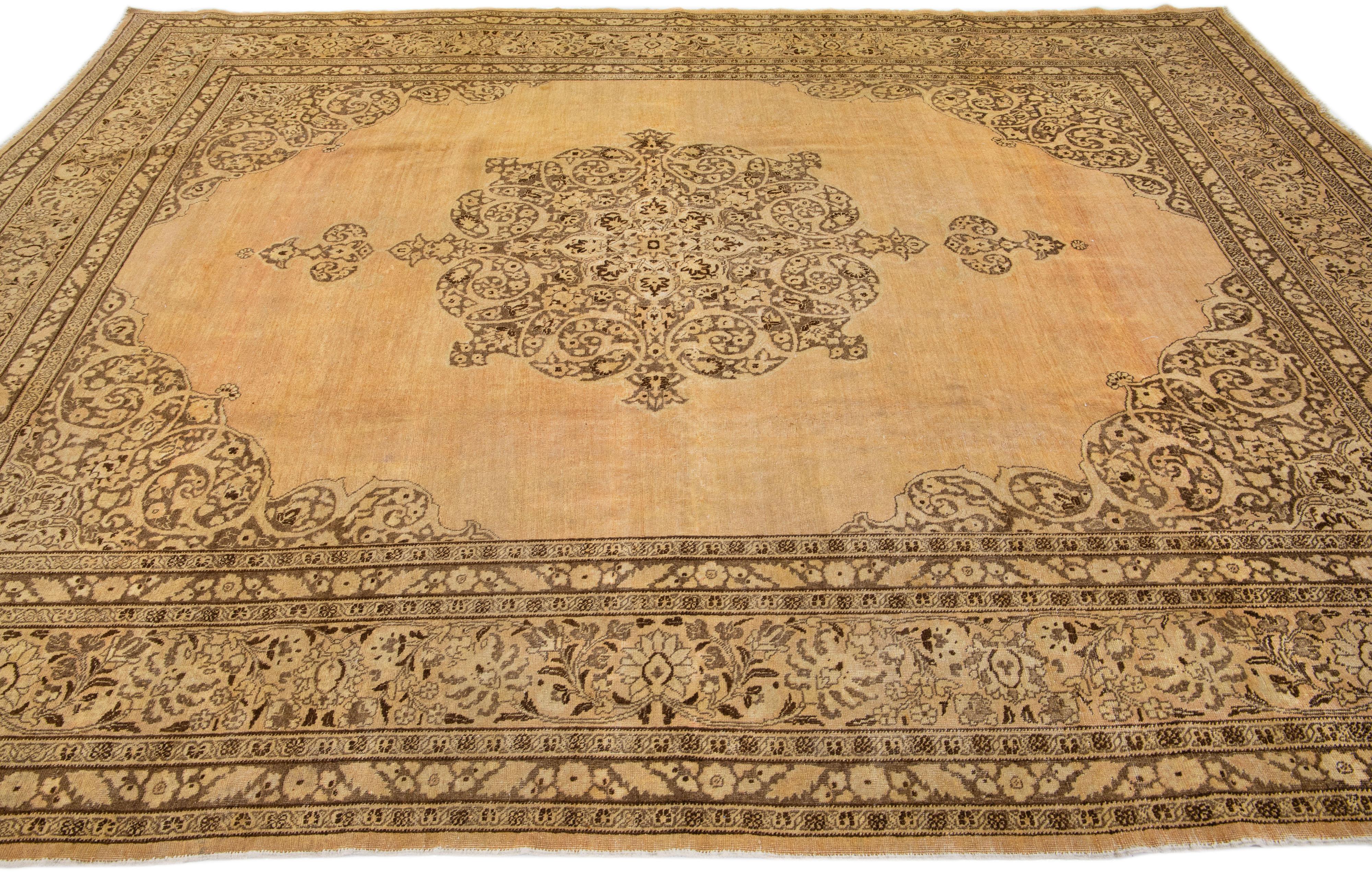 Tan Handmade Antique Persian Tabriz Wool Rug with Medallion Motif For Sale 2