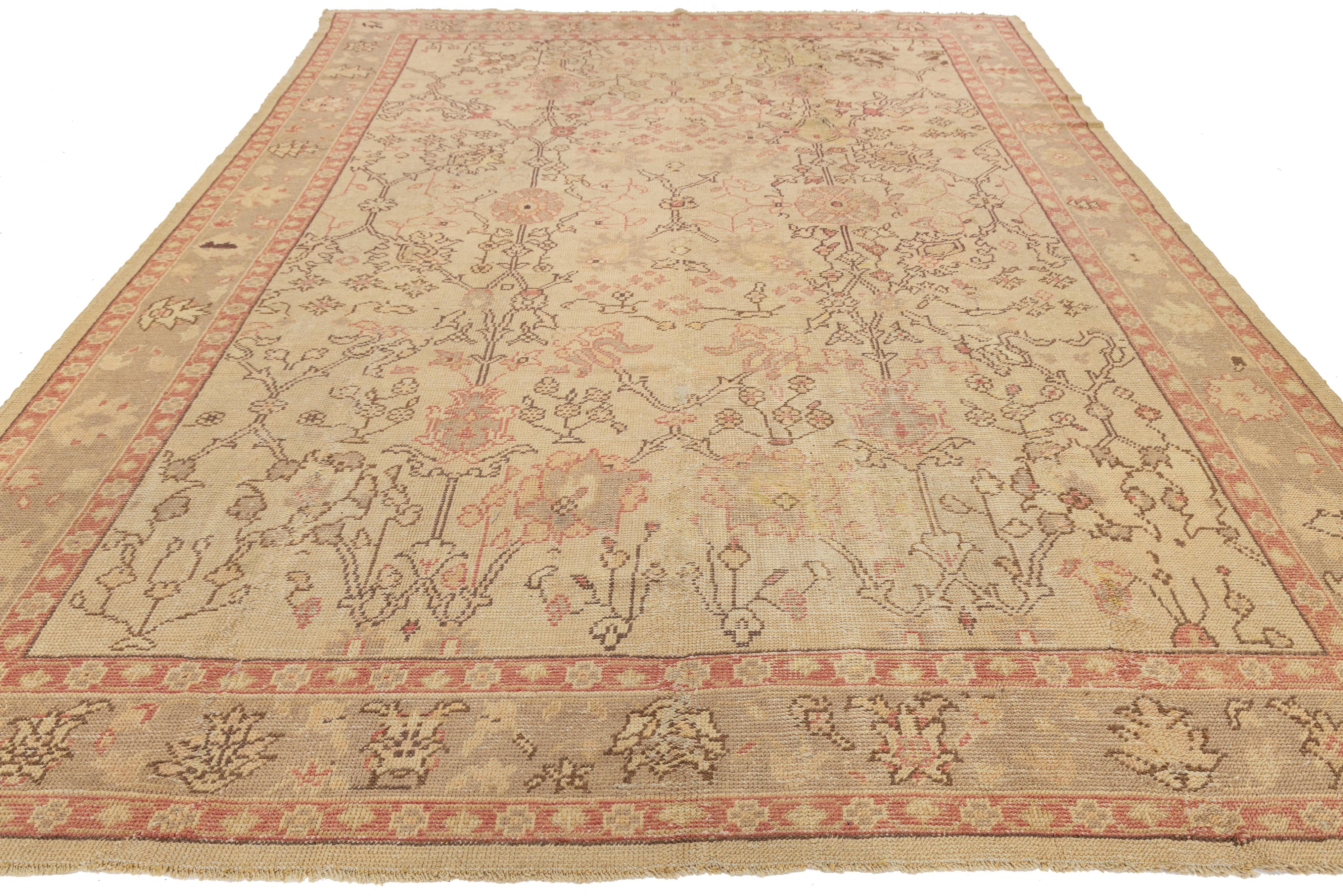 Tan Handmade Turkish Oushak Wool Rug Featuring a Floral Motif For Sale 6