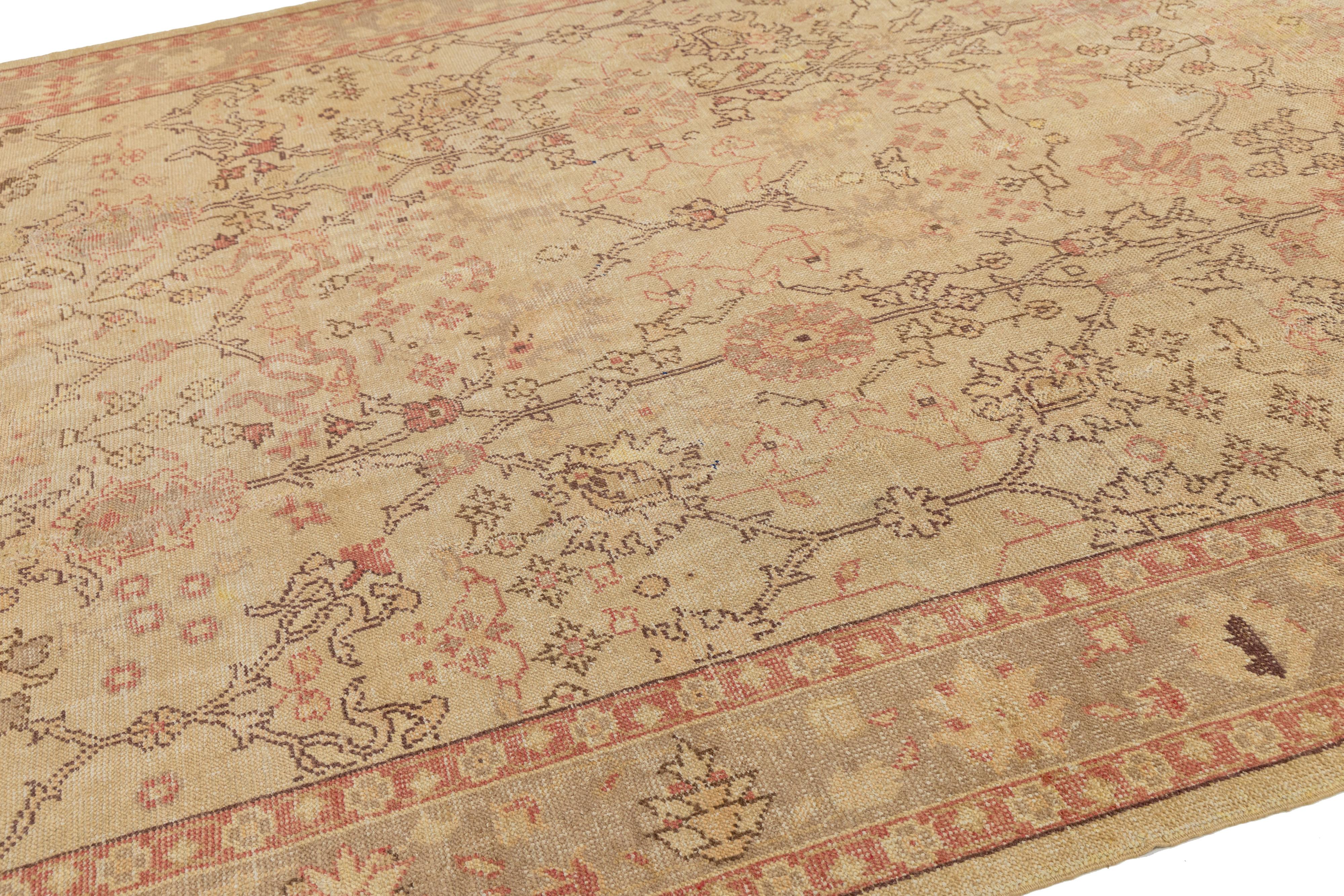 Tan Handmade Turkish Oushak Wool Rug Featuring a Floral Motif For Sale 1