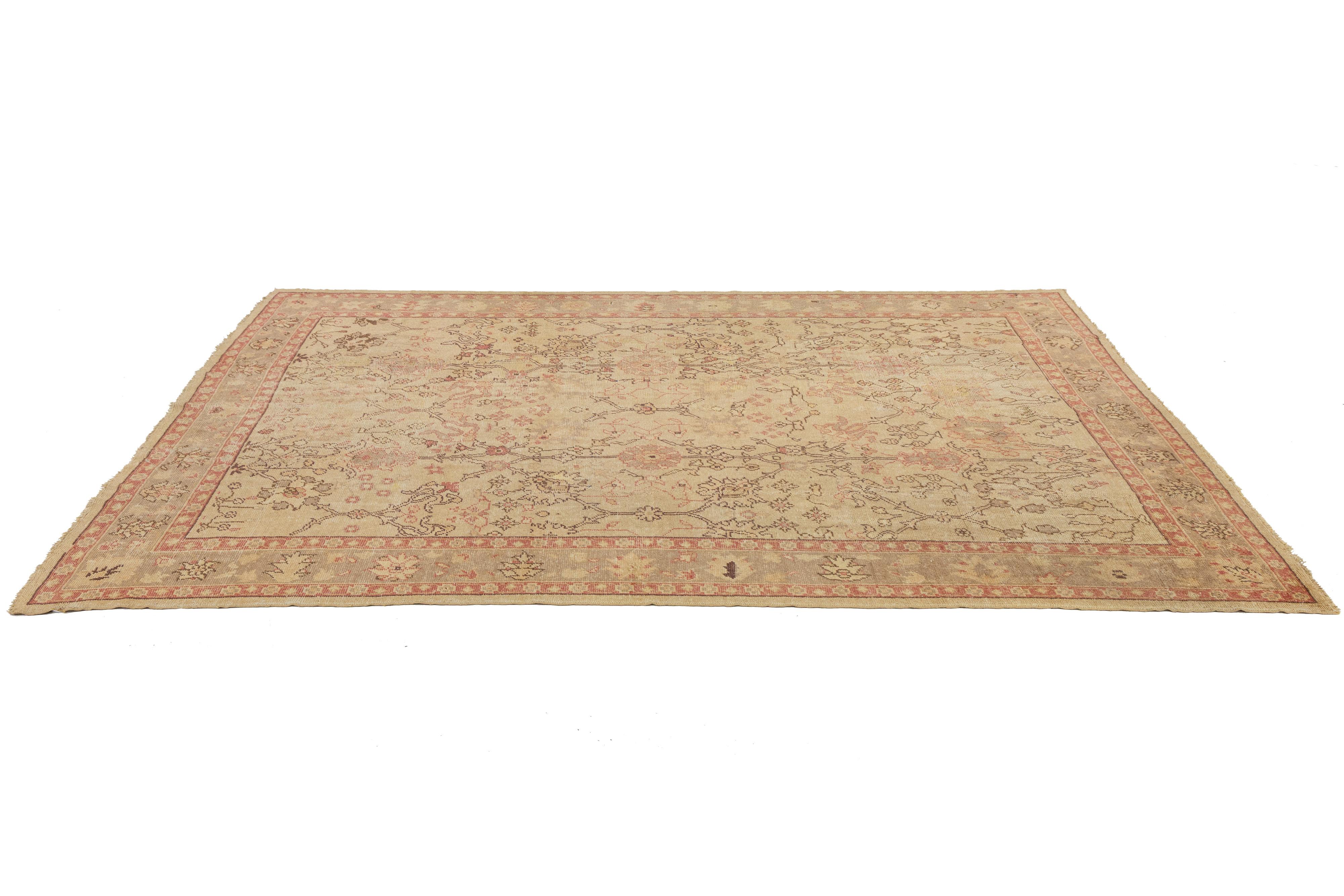 Tan Handmade Turkish Oushak Wool Rug Featuring a Floral Motif For Sale 2