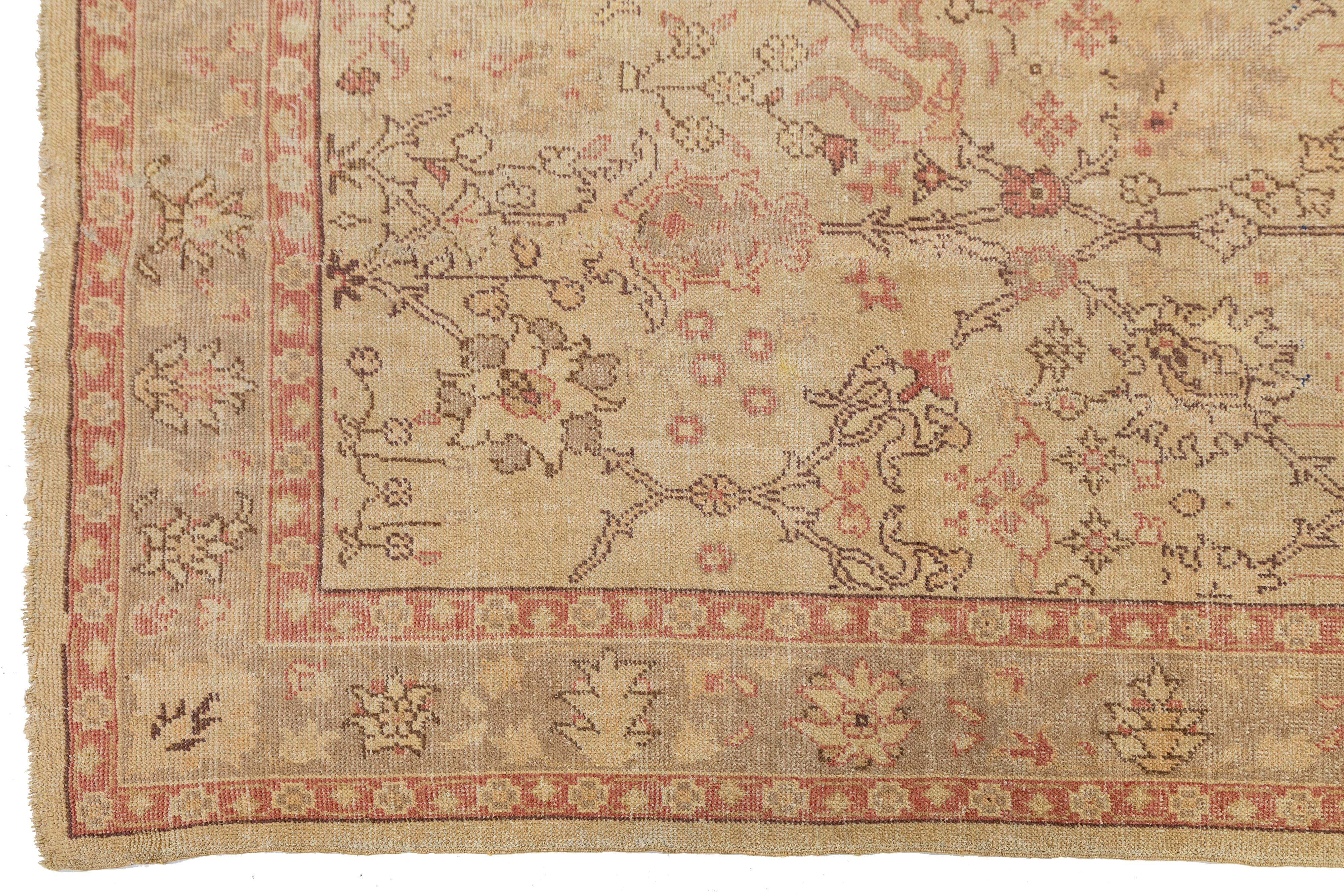 Tan Handmade Turkish Oushak Wool Rug Featuring a Floral Motif For Sale 3