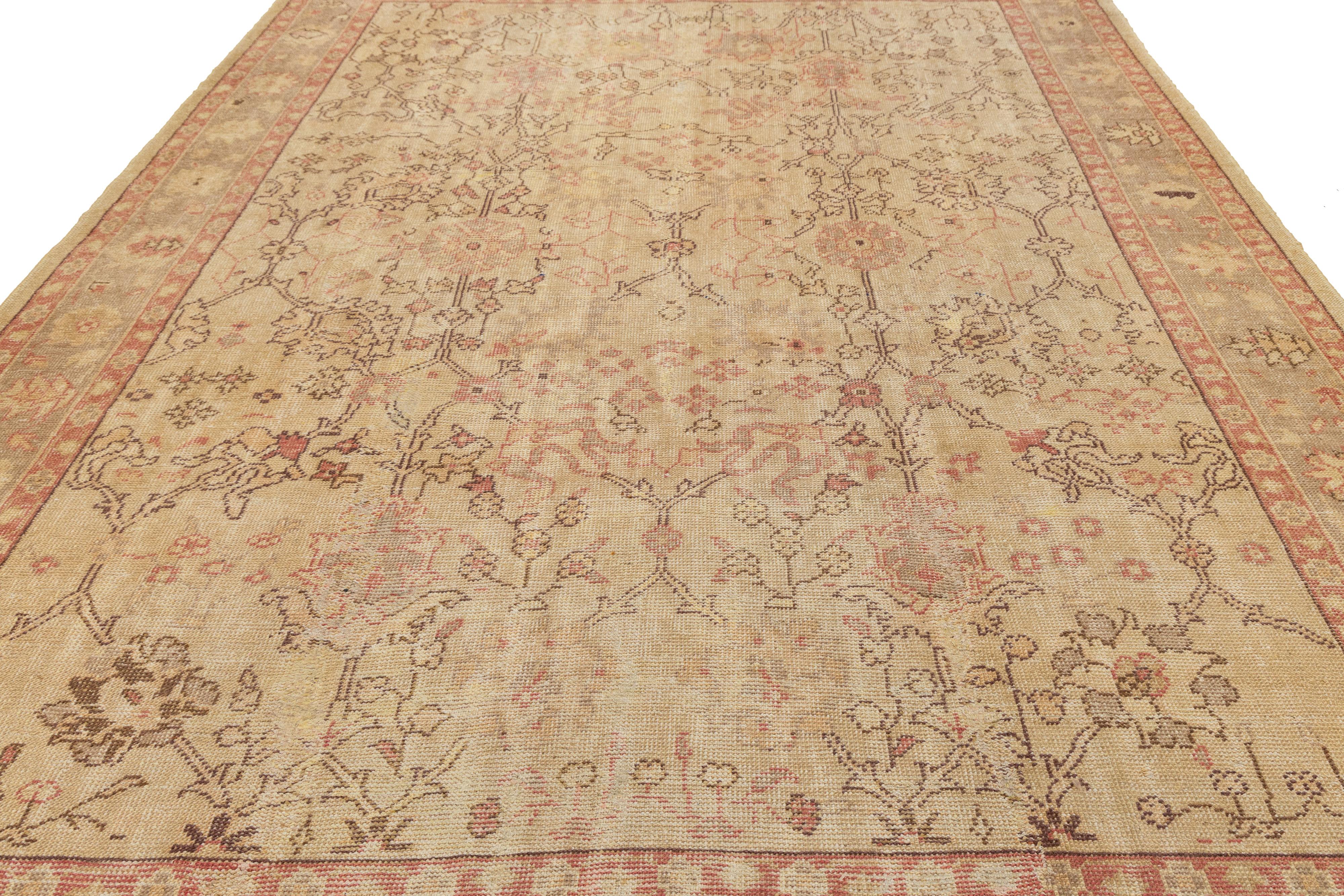 Tan Handmade Turkish Oushak Wool Rug Featuring a Floral Motif For Sale 4