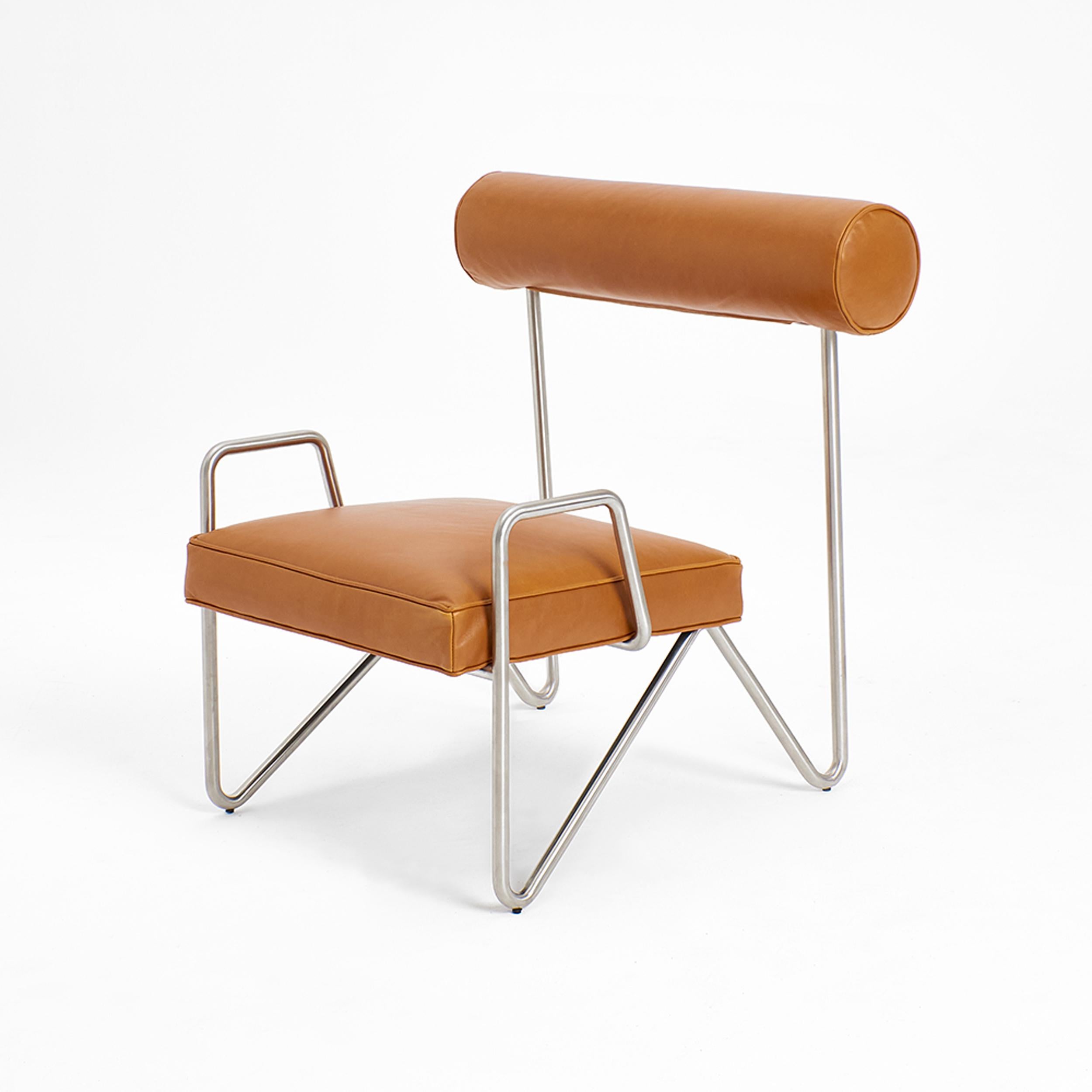 Tan Larry's Lounge Chair by Project 213A
Dimensions: W 56 x D 67 x H 82 cm
Materials: Leather, metal.

Simple yet ingenious, a continuous metal frame bent and shaped to form the base for a rich leather seat.

Project 213A is a European design