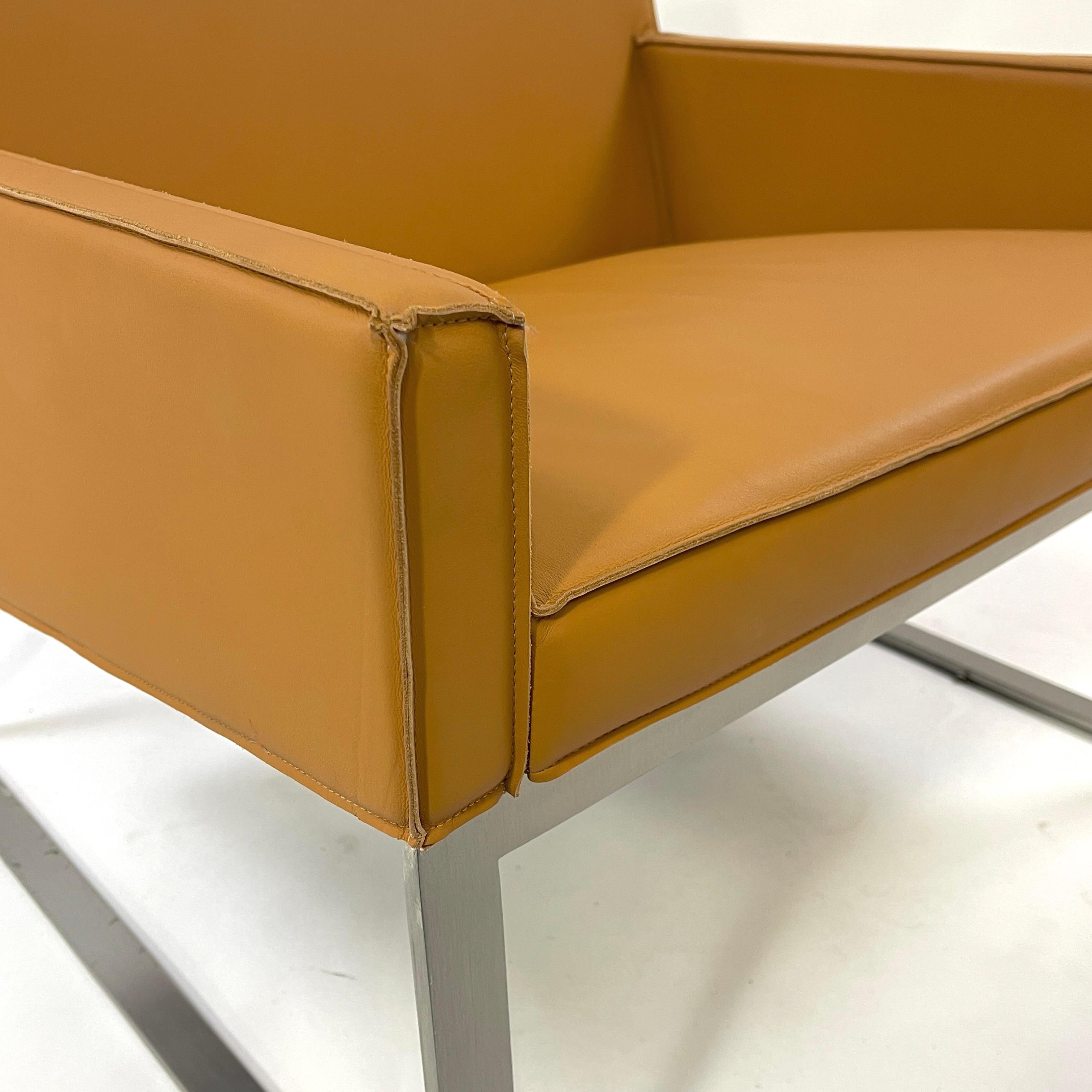 Simply stunning 'B3' Lounge Chair designed by Fabien Baron for Bernhardt. Bernhardt has upped it game with this stunning design. These chairs were custom made with a butter soft tanned leather that has subtle visible stitching at the arms and edges.