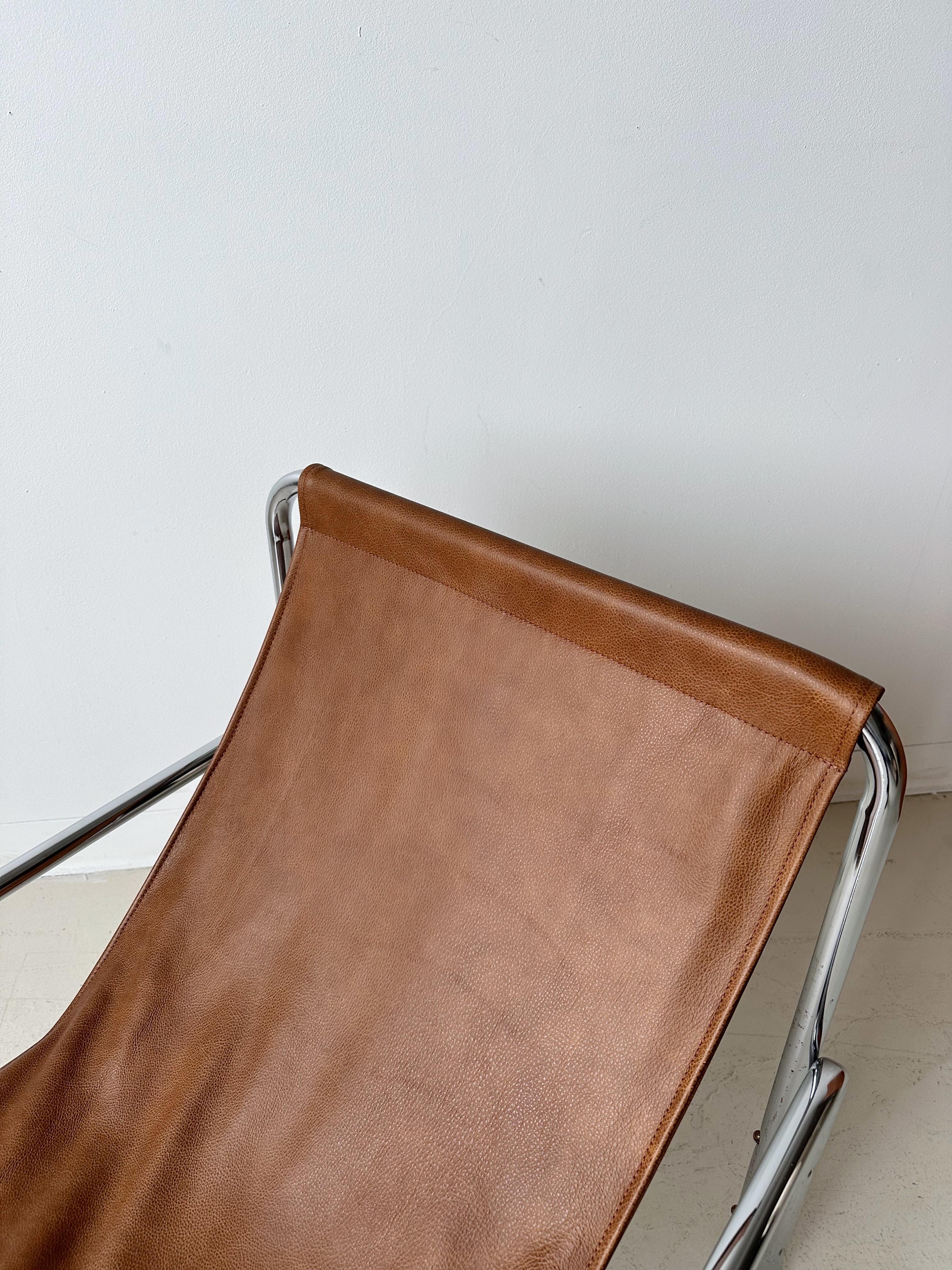 Tan Leather Sling Chair with Tubular Chrome Frame

//


Dimensions:

26”W x 27.5”D x 28”H  - seat height 13
