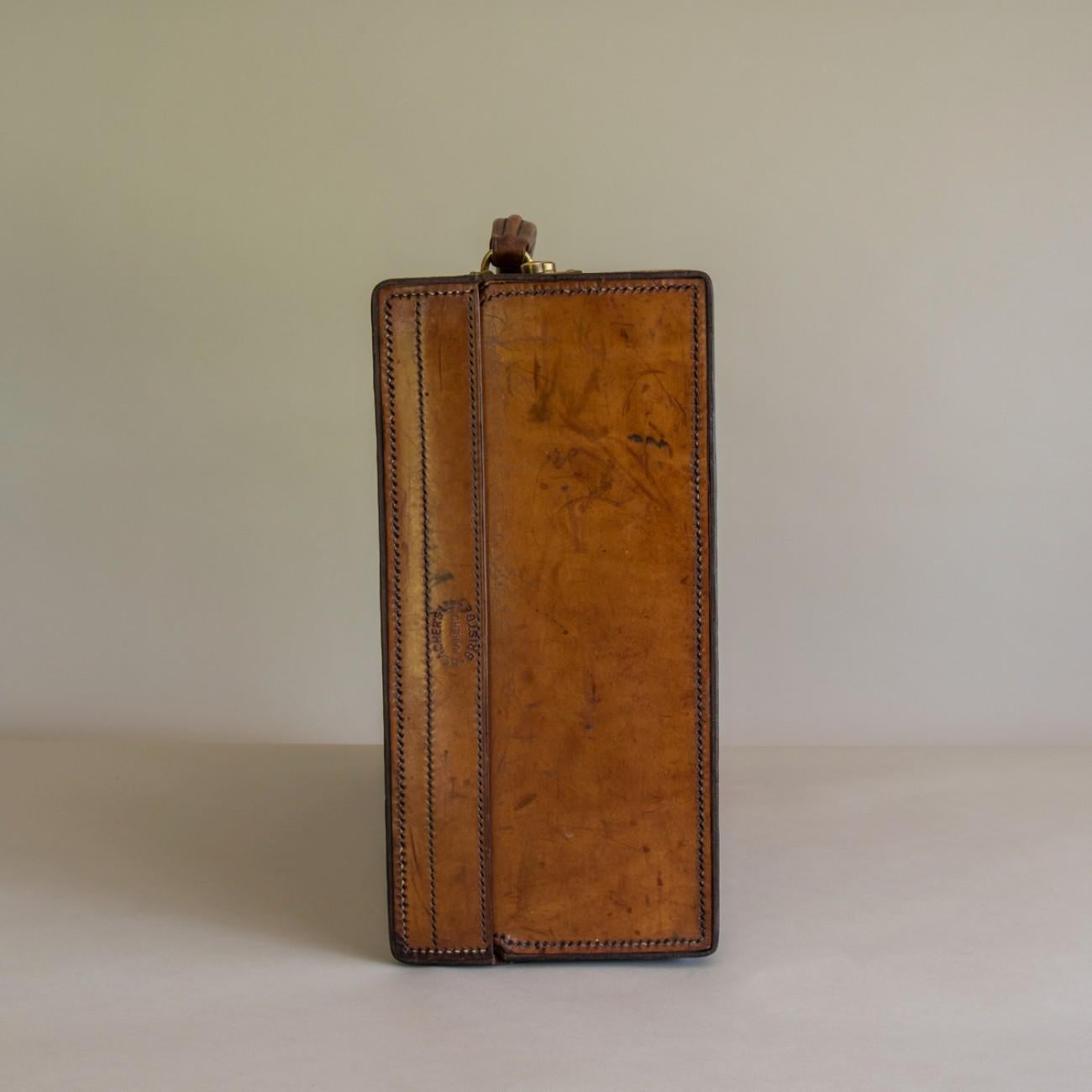 Tan Leather Suitcase, circa 1900. 5