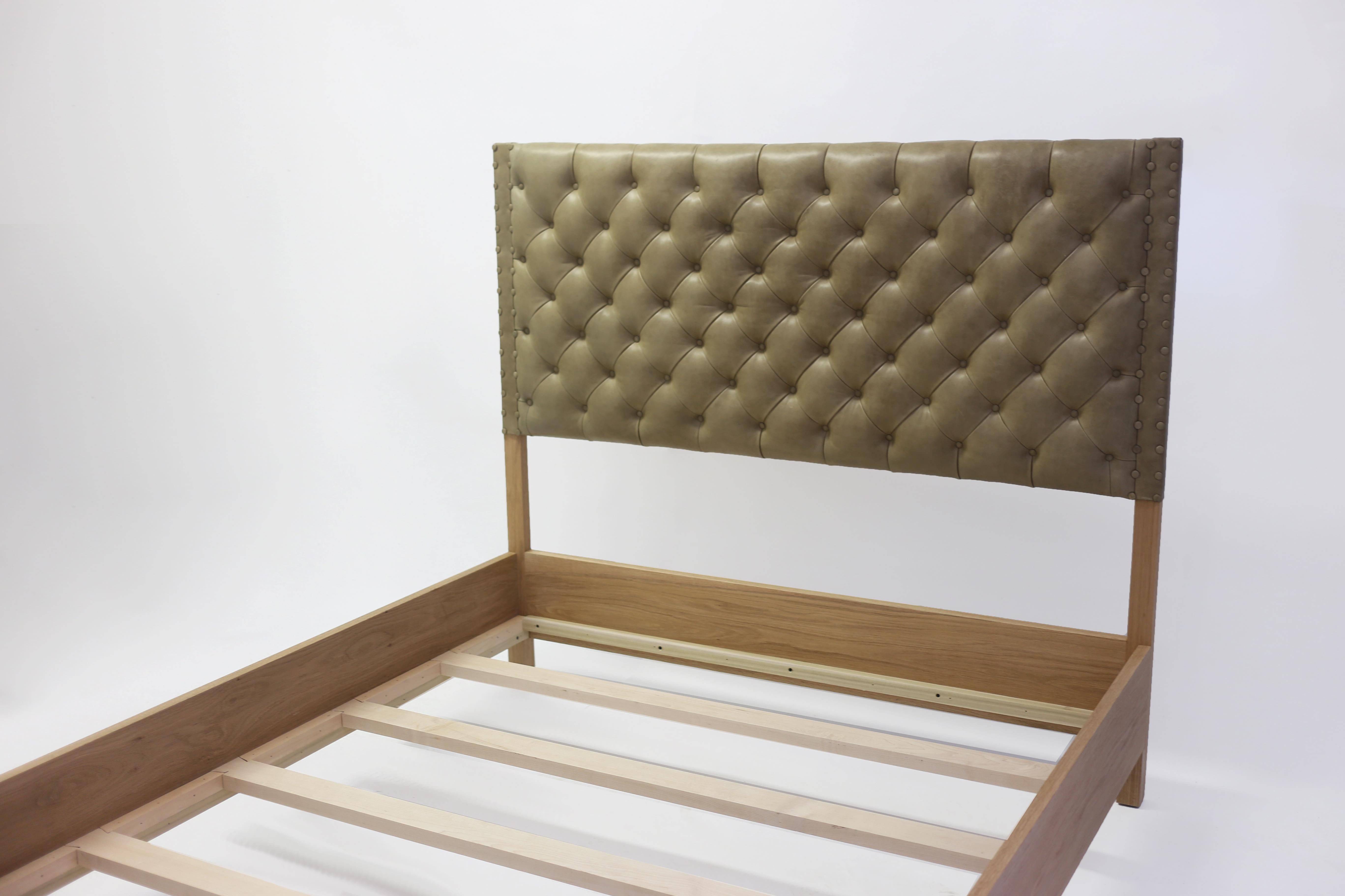 The Belfort Bed, part of the LF Collection, shown made with oak frame with stunning grain details - the headboard and base is all handcrafted with tufting and self covered buttons in the tufts and along the edge. Can be made custom as well as have a
