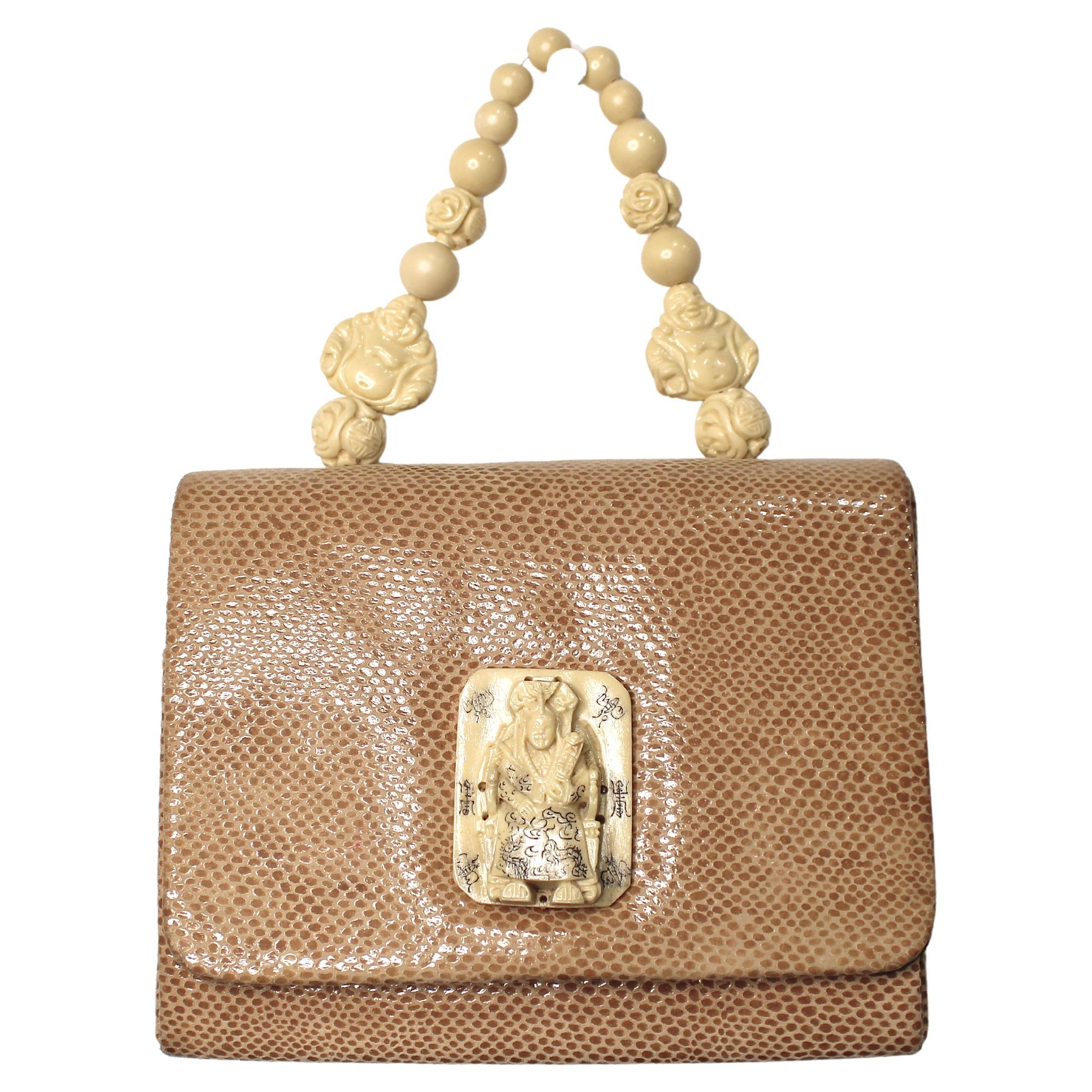Tan Lizard Embossed Suede 
Bone Bead Style Handbag circa 1960s en vente