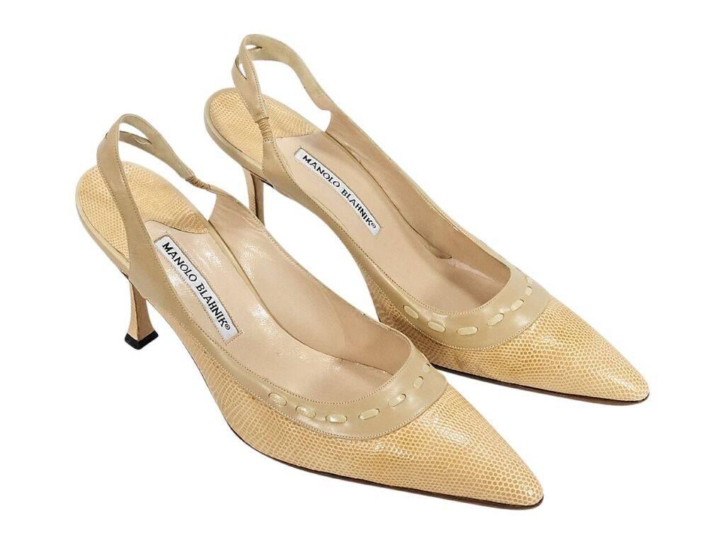 Product details:  Tan embossed leather slingback pumps by Manolo Blahnik.  Trimmed with smooth leather.  Whipstitching accents vamp.  Point toe.  Slip-on style.  Dust bag included.  Label size EU 40.5.  4