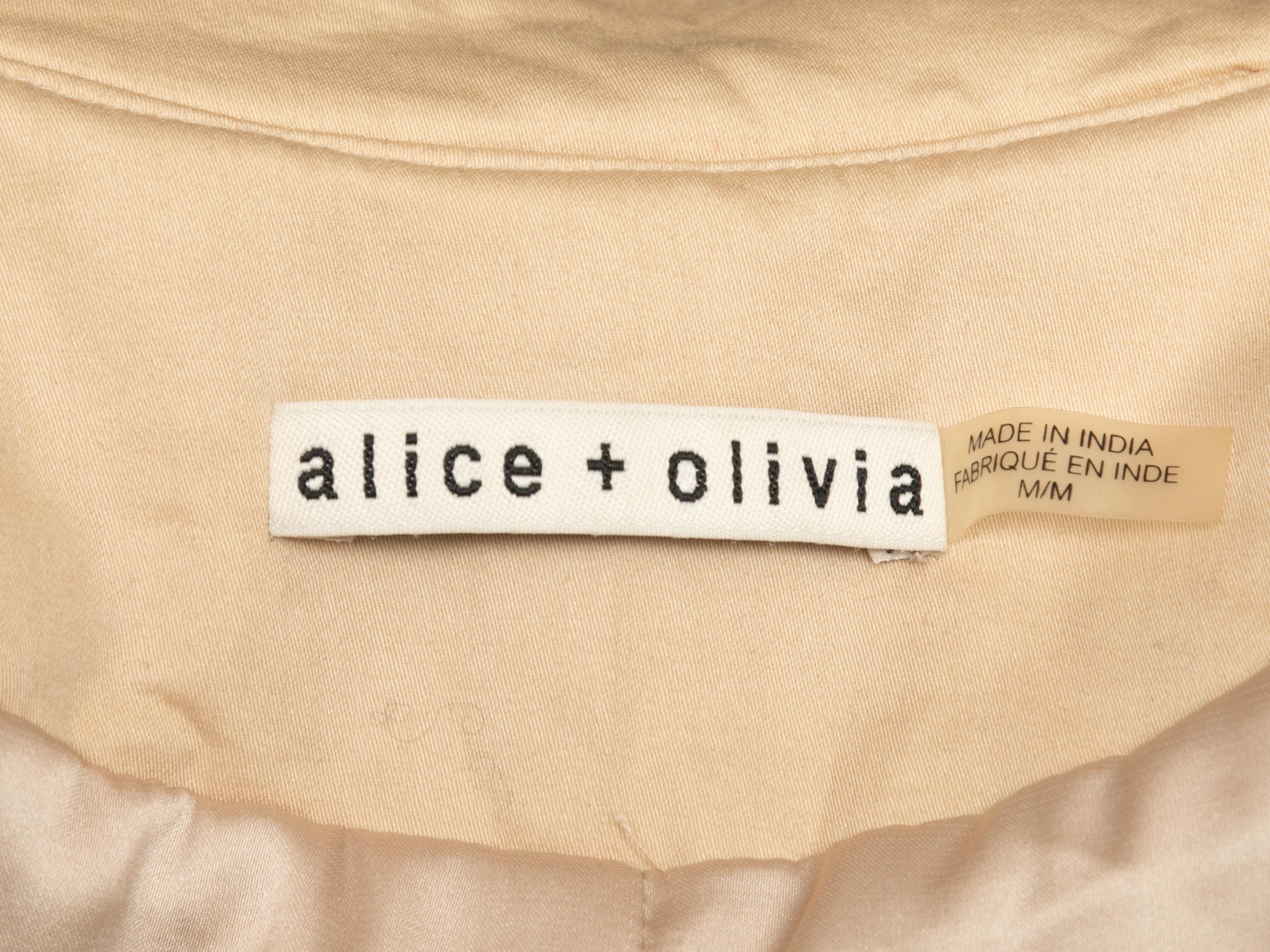 Tan and multicolor embroidered and bead-embellished jacket by Alice + Olivia. Stand collar. Zip closure at center front. 32
