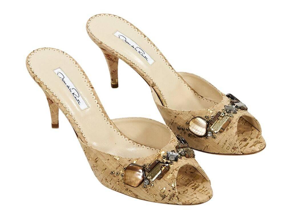 Product details:  Tan cork sandals by Oscar de la Renta.  Multicolor stones accent vamp.  Peep toe.  Slip-on style.  Dust bag included.  Label size EU 41.  3.5