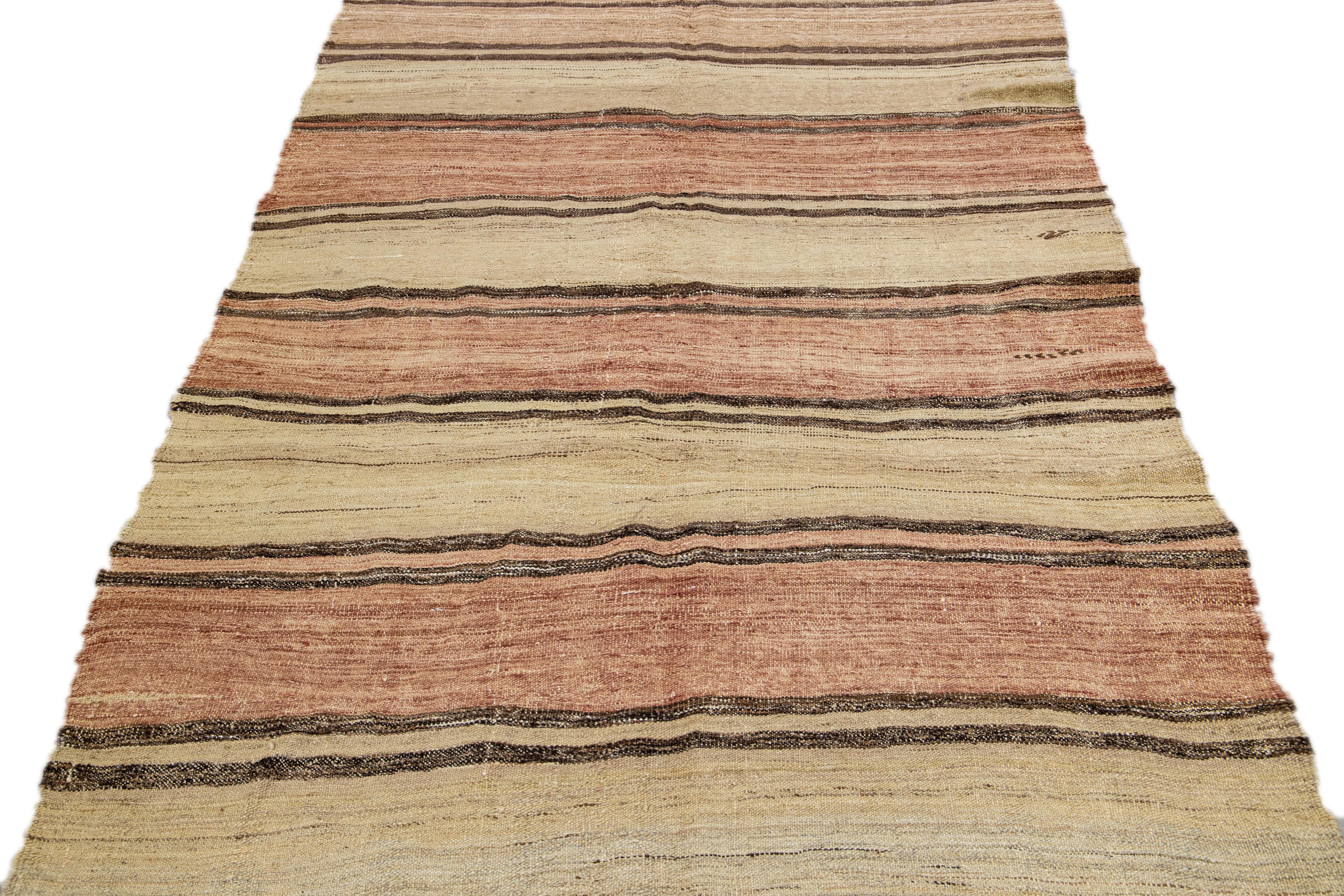 Turkish Tan Vintage Kilim Handmade Flatweave Striped Motif Wool Rug For Sale