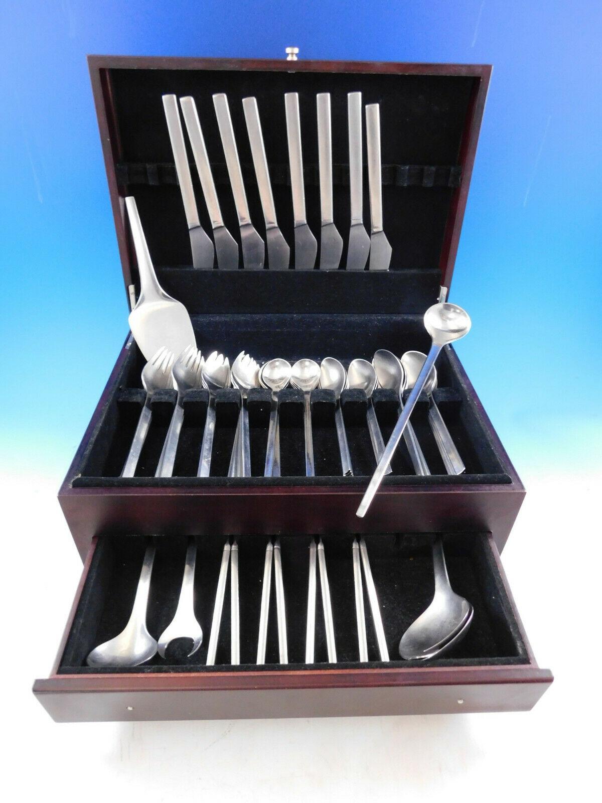 Vintage Tanaquil stainless steel flatware set by Georg Jensen.
This 62 piece set includes:

8 dinner knives, 8 7/8