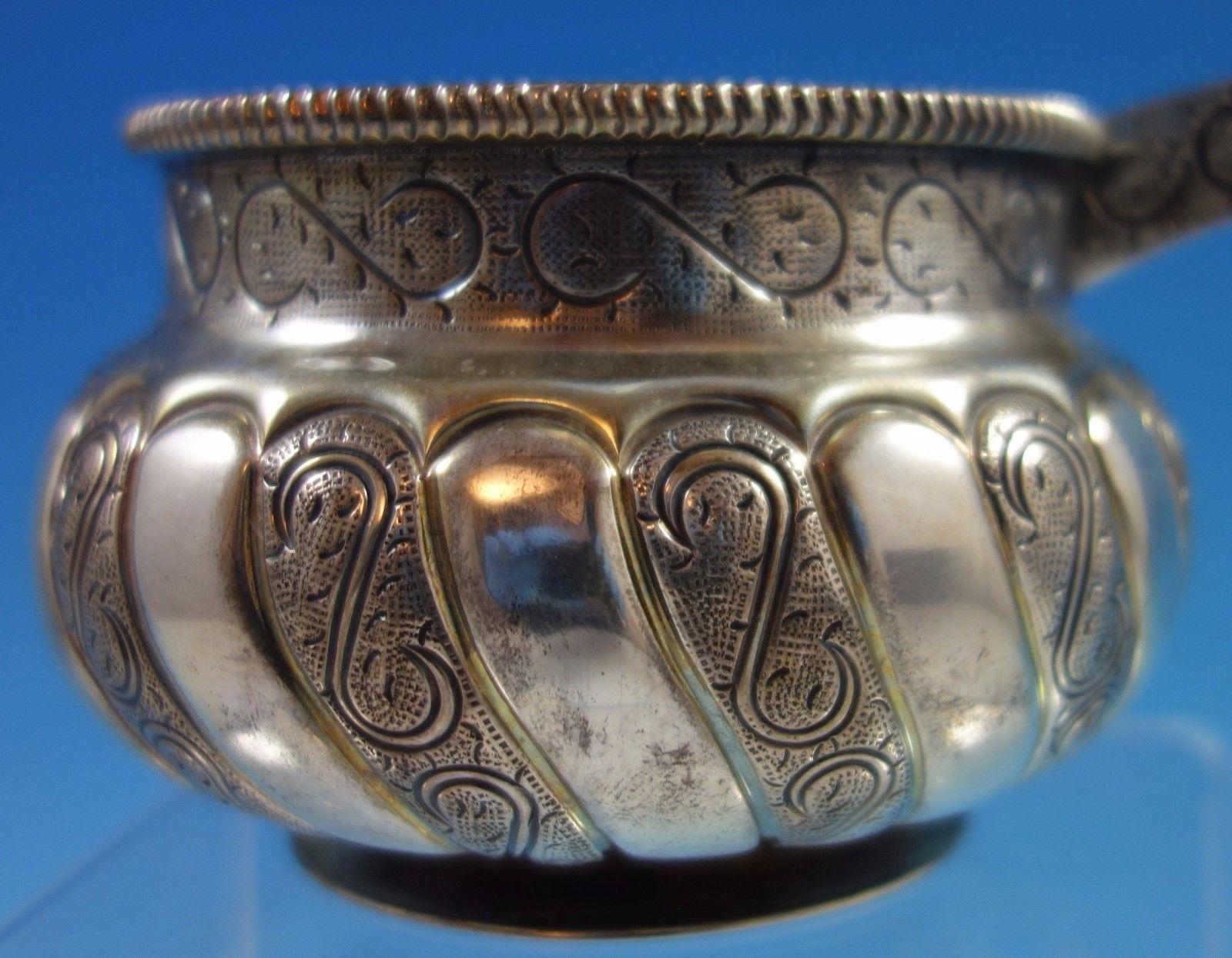 Tane Mexican sterling silver cossack kovsh bowl. The piece has Russian influence with gold wash. The bowl measures 3 tall and 5 1/4 wide, and it weighs 11.5 ozt. It is not monogrammed and is in excellent condition. Extraordinary! 

 