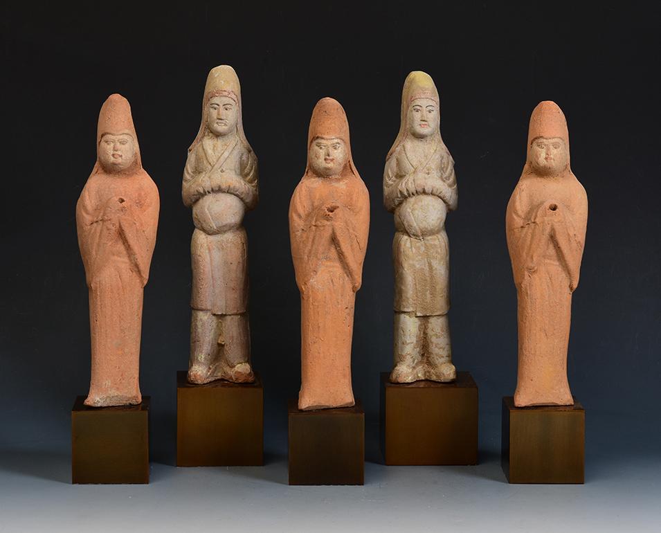 A set of antique Chinese painted pottery soldier.

Age: China, Tang Dynasty, A.D. 618 - 907
Size excluding stand: Height 23.3 - 24.4 C.M. / Width 5.9 - 6.1 C.M.
Height including stand: 29.1 - 30.7 C.M.
Condition: Well-preserved old burial condition