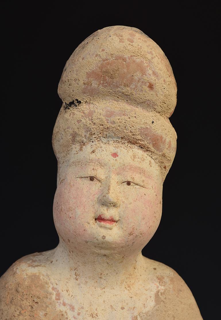 Chinese painted pottery fat lady. 

Age: China, Tang Dynasty, A.D. 618 - 907
Size: Height 33.2 C.M. / Width 10 C.M.
Condition: Well-preserved old burial condition overall.

100% Satisfaction and Authenticity Guaranteed with FREE 