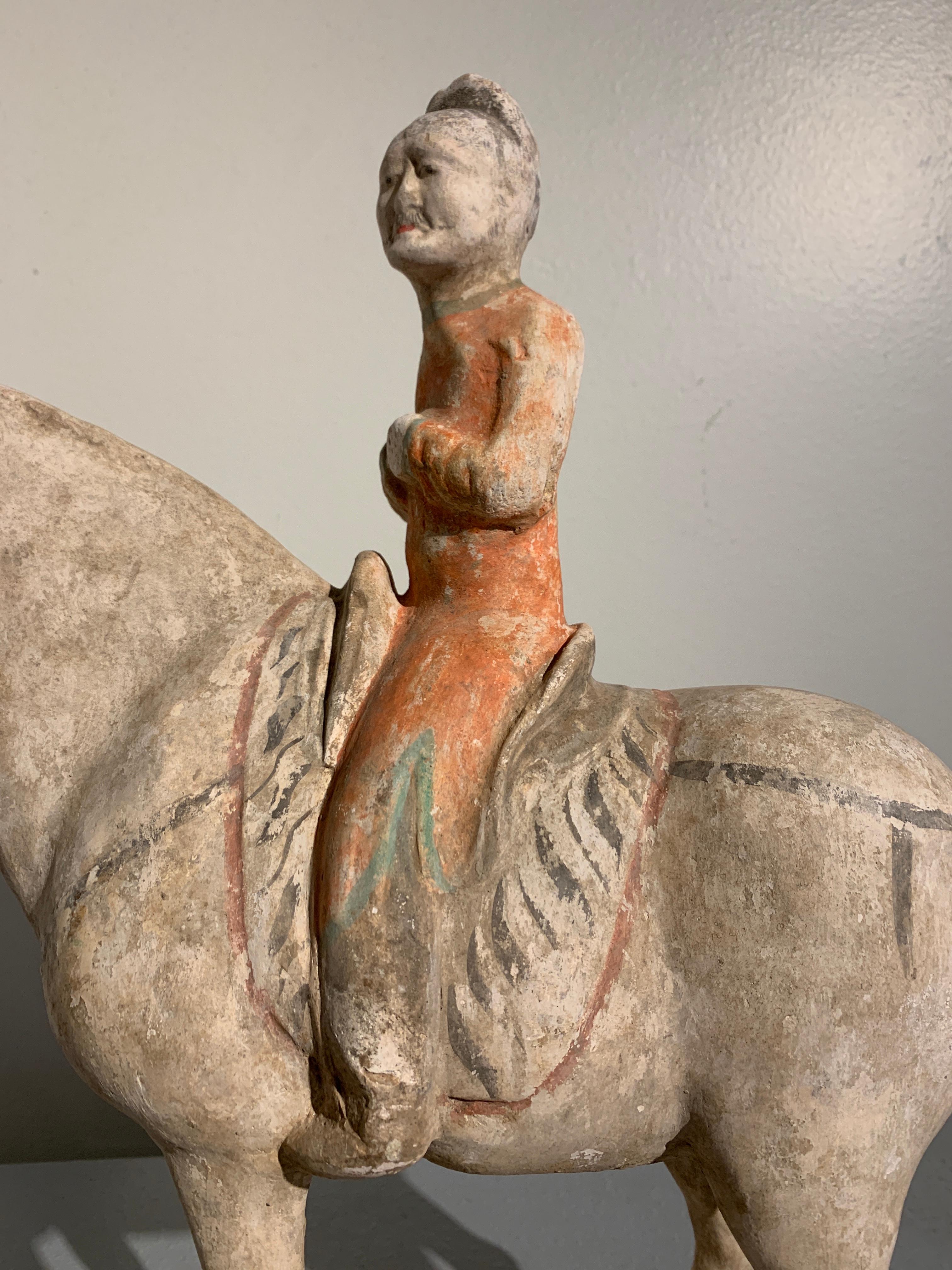 18th Century and Earlier Tang Dynasty Horse and Rider, Painted Pottery, circa 9th Century, China