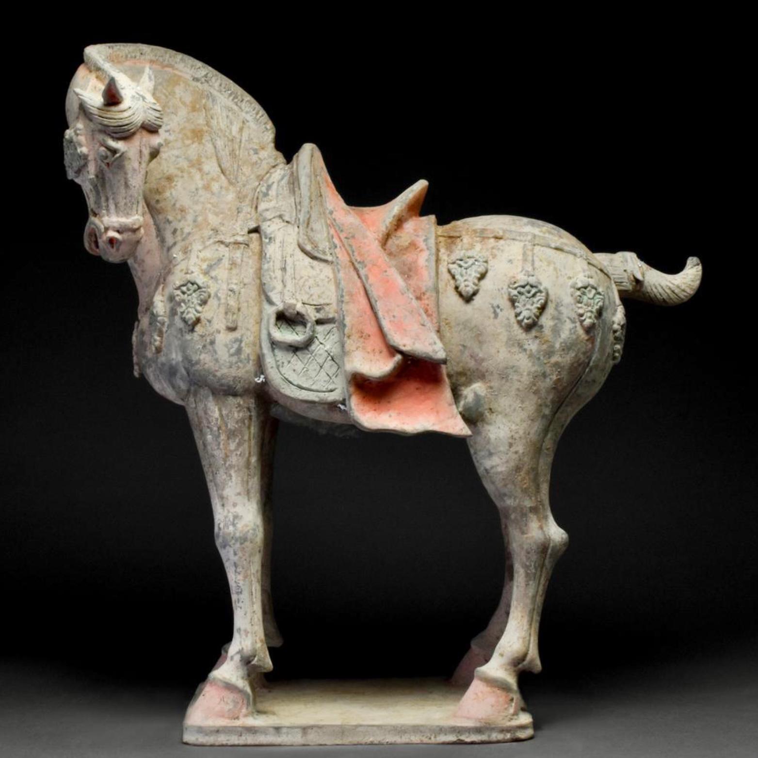 Large And Important Tang Dynasty (618-907AD) Pottery Horse TL Tested. China.

Ca. 618-907 AD A beautiful pottery figure of a horse. The animal is shown in a standing pose on an integral base. The horse's neck is turned to the left, with its erect