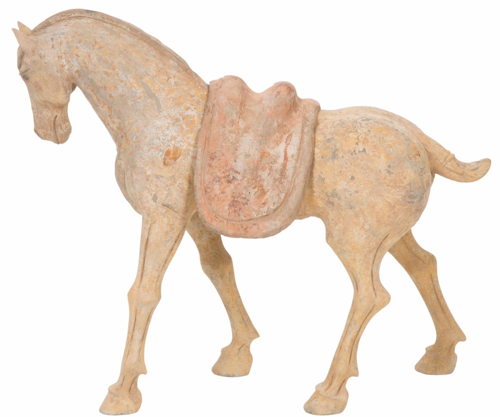 A Tang Dynasty (618 - 907AD) Chinese Pottery Horse with Saddle. No TL test but absolutely guaranteed authentic with COA available upon request.

Dimensions: 14 x 6.75 x 17 inches (35.6 x 20.3 x 43.2 cm)

Condition; Very Good with wear