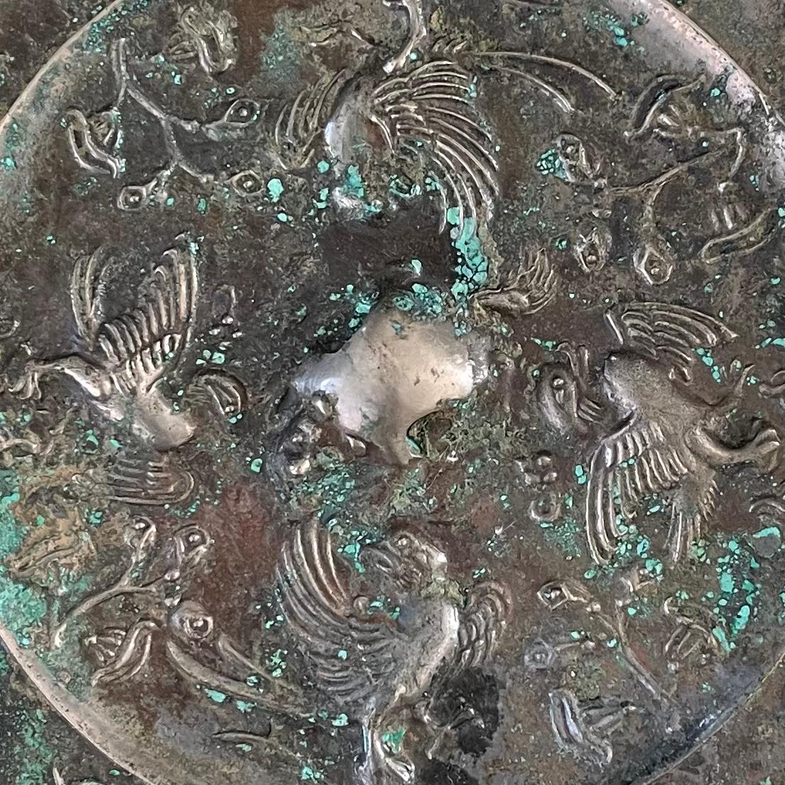 Cast Tang Dynasty Silvery bronze lobed “Beast and Birds” Mirror For Sale