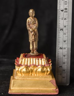 Tang Or Later Solid Cast Bronze Monk With A Vase With Remains Of Rich Gilding
