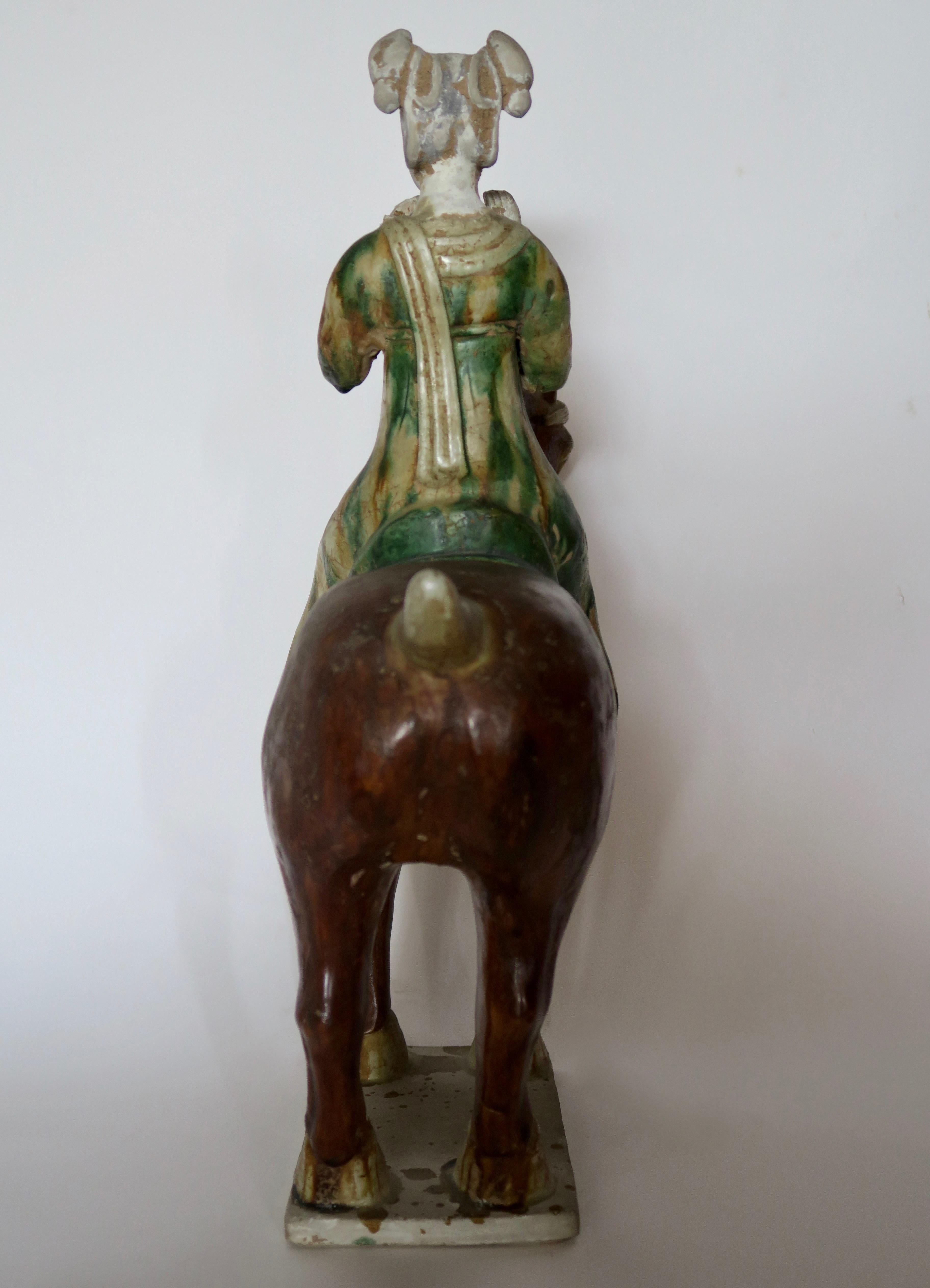 18th Century and Earlier Tang Sancai Glazed Terracotta Horse with Lady Musician For Sale