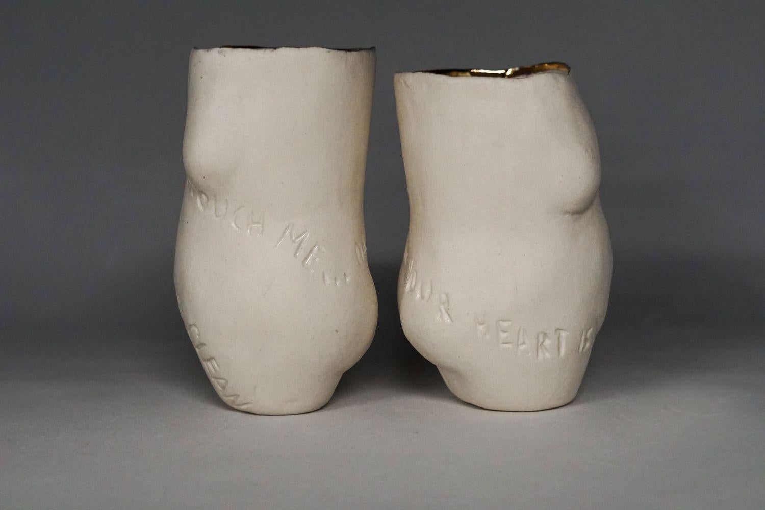 Other Tangible Morality, Pair of carved porcelain cups with gold rim 