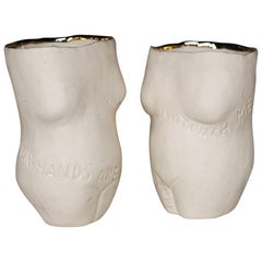 Tangible Morality, Pair of carved porcelain cups with gold rim 