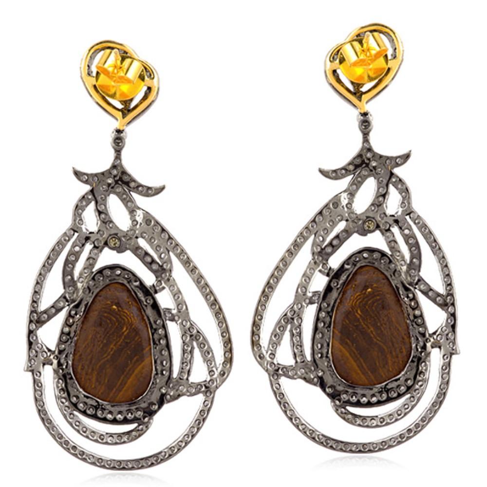Art Nouveau Orecchino doppio di opale intrecciato con pavé di diademi in oro e argento 18 carati in vendita