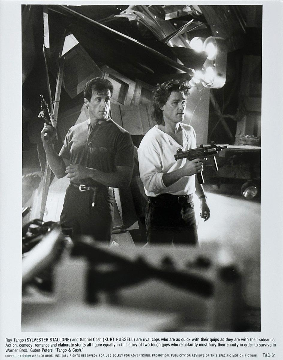 Original Warner Bros 8x10 inches Publicity Still for Tango & Cash (1989) featuring a great image of Sylvester Stallone and Kurt Russell.

Publicity (film/production) stills were created to help studios promote their new films. The stills were