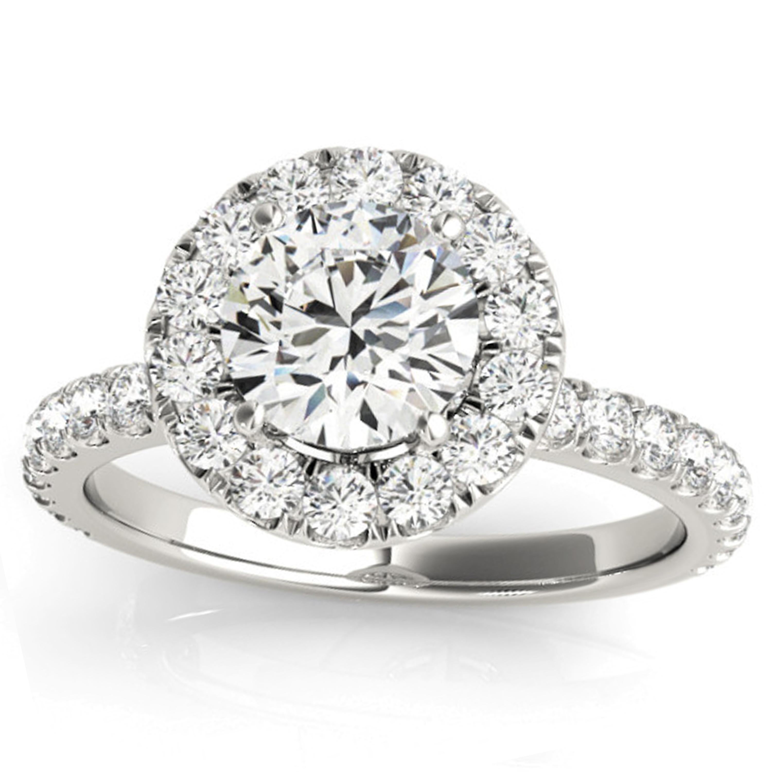 Shimmering white diamonds dance delicately along the shank and surround the halo of this Valorenna one of a kind engagement ring. The GIA certified center stone shines admirably and appears bigger in this halo setting.

Matching Band Is Not