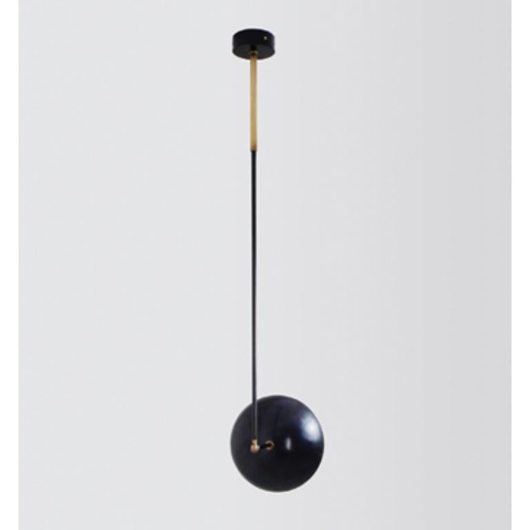 Tango I dome, sculpted pendant by Paul Matter.
Dimensions: W 30 x D 30 x H 148 cm.
Materials: Brass
Available in different finishes.

Tango is born from playful experimentation with vintage lighting components.
Burnt, aged brass and etched