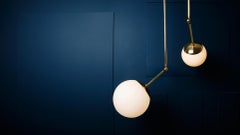 Tango II, Colgantes esculpidos dobles de Paul Matter