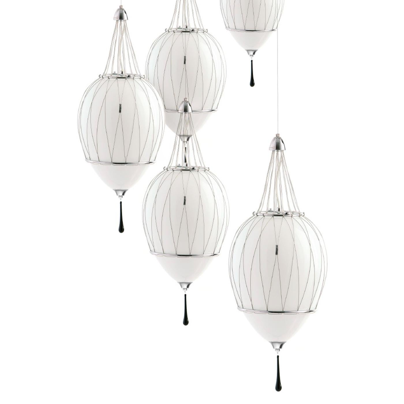 Inspired by Art Deco style, this superb pendant lamp features an alluring design that blends classic elegance with a modern allure that will enrich any interior with luxury. This exclusive piece from the Tango Collection boasts an egg-shaped shade