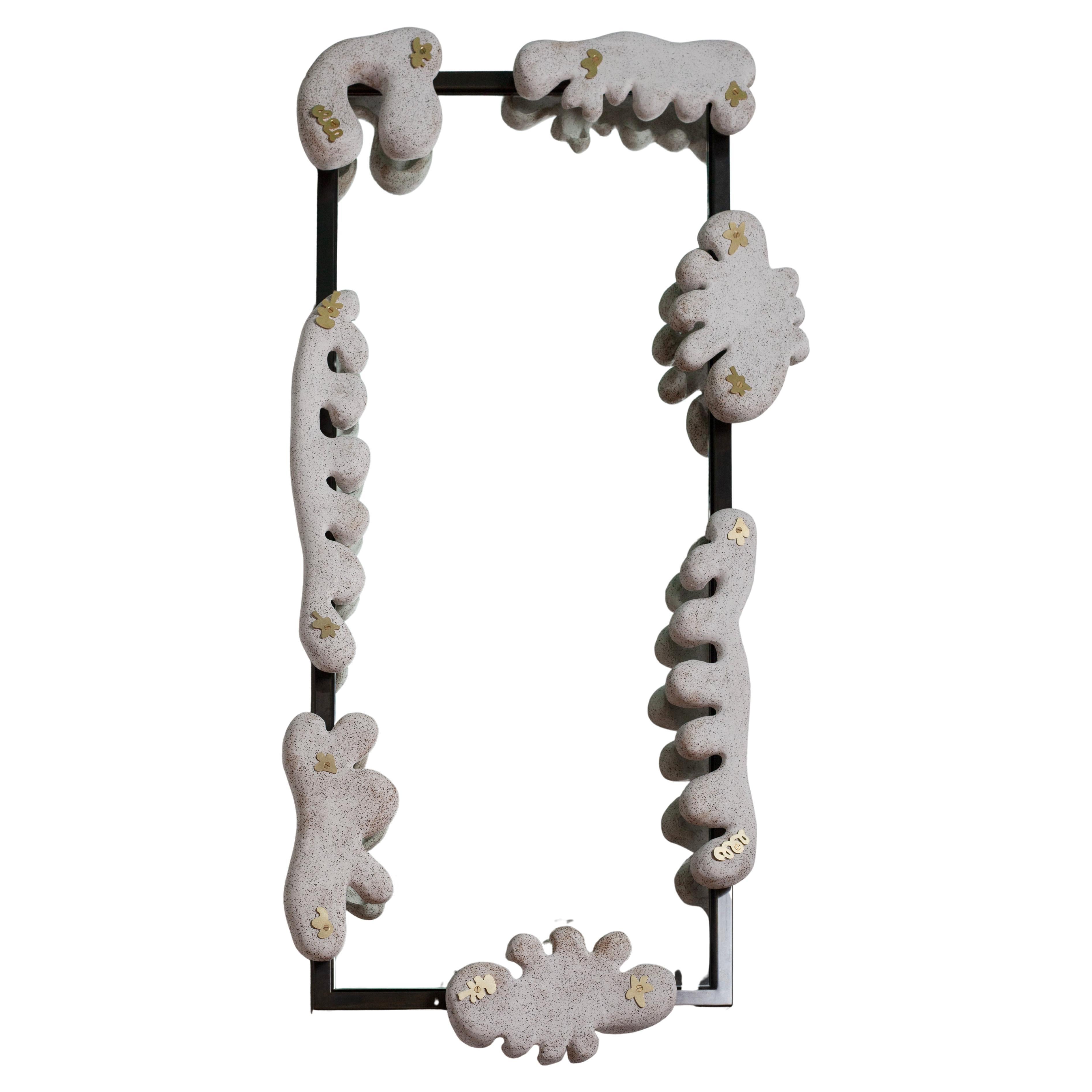 Created in collaboration between Luft Tanaka and Michelle McLaughlin, the Tanguay wall mirror is composed of handbuilt ceramic speckled stoneware forms, with a custom made matte white glaze. The pieces are arranged around a darkened steel frame with