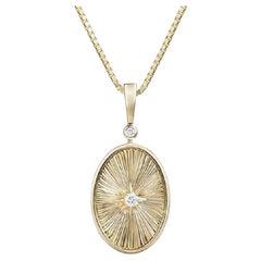 Tanisa Nahata Diamant 0.084ct. Pendentif en or jaune 18 carats.
