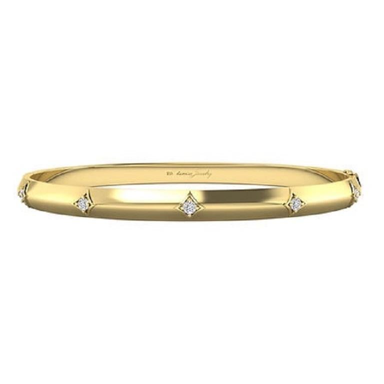 Le bracelet Diamond Modern Gold Reign en or 18 carats respire l'élégance contemporaine, avec un design épuré mis en valeur par des diamants sertis de manière experte. Cette pièce allie harmonieusement minimalisme moderne et éclat luxueux, ce qui en