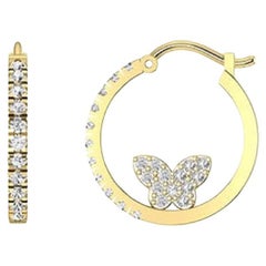 Diamante Tanisa Nahata 0,52 ct. Pendientes de aro con mariposa en oro de 18 quilates.
