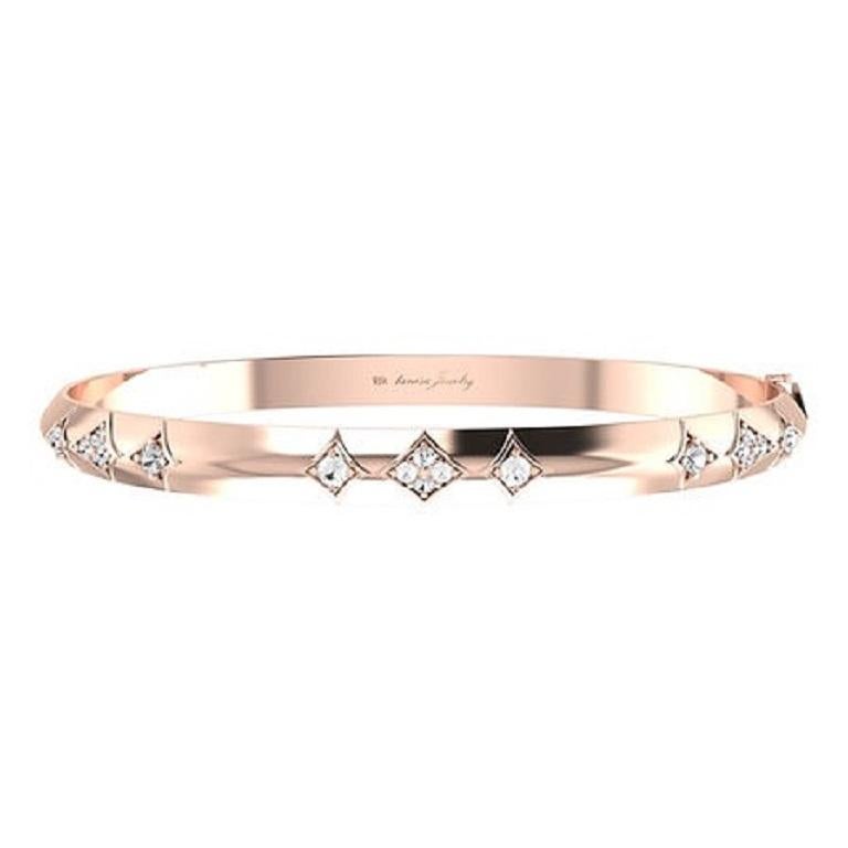 Introducing the Classic Diamond Bangle in 18Karat white, rose, and yellow gold
a timeless symbol of elegance. This bangle showcases a seamless row of radiant diamonds, meticulously set to create a captivating sparkle with every movement. The sleek
