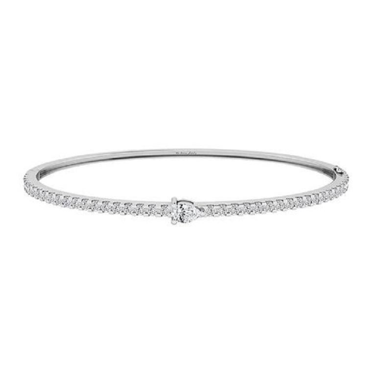 Contemporary Tanisa Nahata Center Pear Diamond 1.05ct. Bangle in 18Karat Gold. For Sale