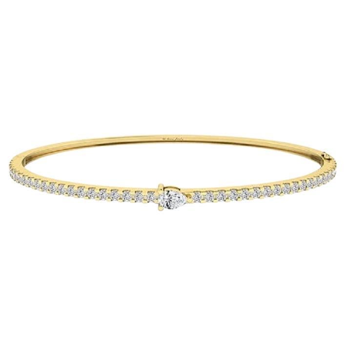 Tanisa Nahata Center Pear Diamond 1.05ct. Bangle in 18Karat Gold.
