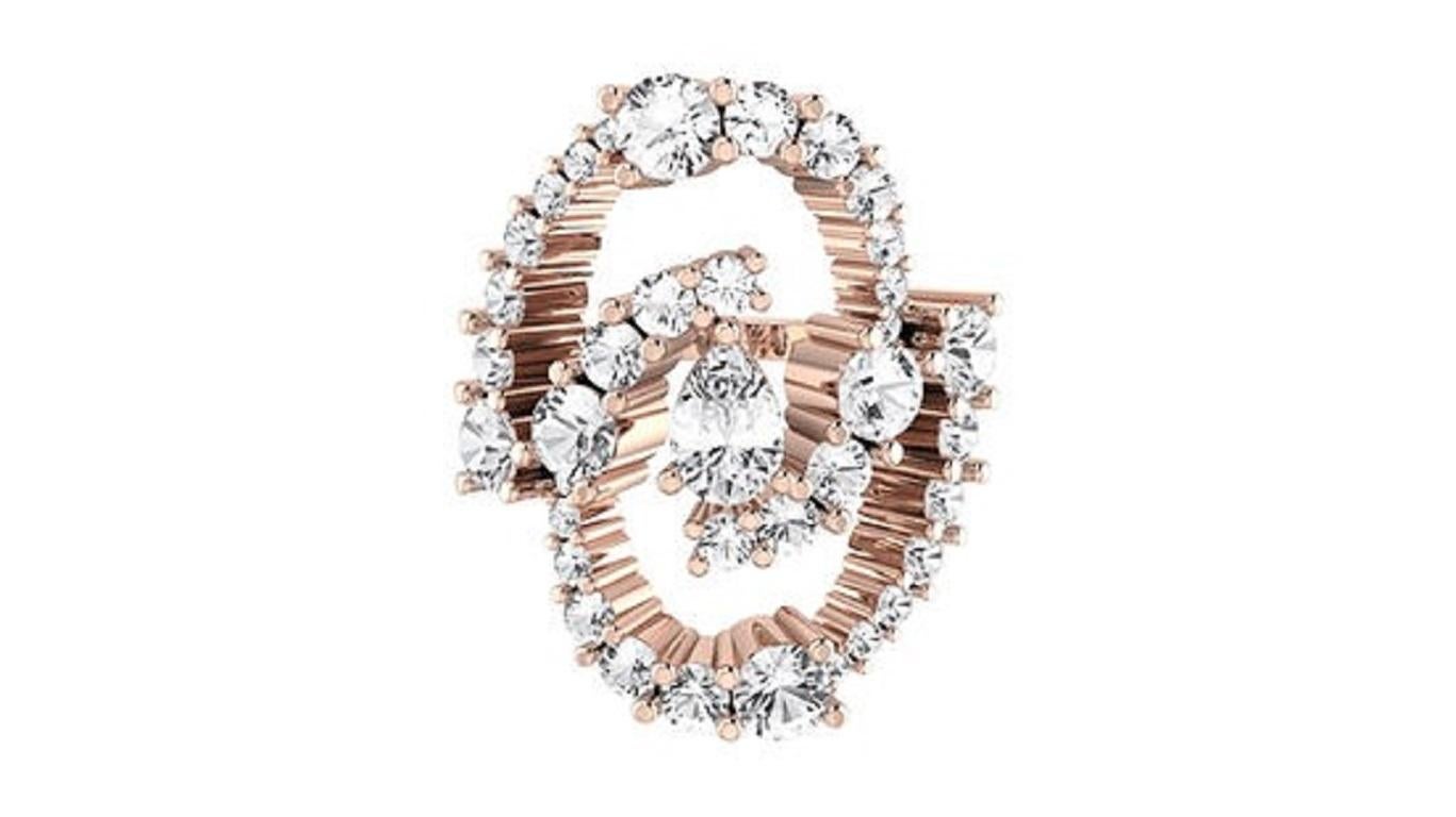 Tanisa Nahata presents a Ocean Wave Diamond statement Ring. crafted in your choice of 18K white, yellow, or rose gold. The flowing wave design is set with sparkling diamonds, evoking the beauty and movement of the ocean, perfect for those seeking