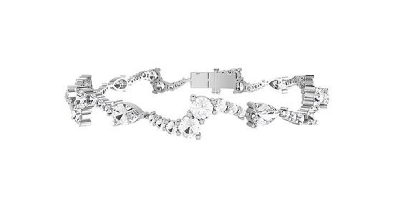 Introducing the Classic Diamond Bracelet in 18Karat white, rose, and yellow gold
a timeless symbol of elegance. This bracelet showcases a seamless row of radiant diamonds, meticulously set to create a captivating sparkle with every movement. The