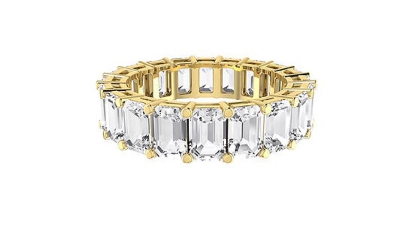 A timeless Diamond Eternity Ring featuring a continuous band of round brilliant diamonds. Available in 18K white, yellow, and rose gold, this elegant piece symbolizes eternal love and adds a refined touch to any look. Perfect for weddings,