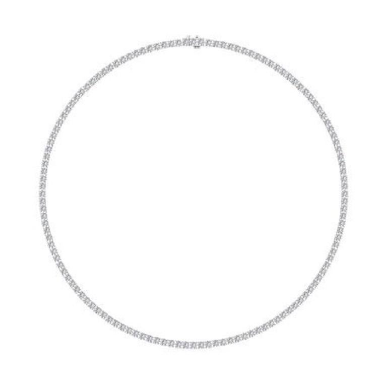 The Diamond Tennis Necklace in 18K gold is a timeless classic, featuring a seamless row of brilliant diamonds that exude elegance and sophistication. Available in white, yellow, and rose gold, this luxurious necklace adds a refined sparkle to any